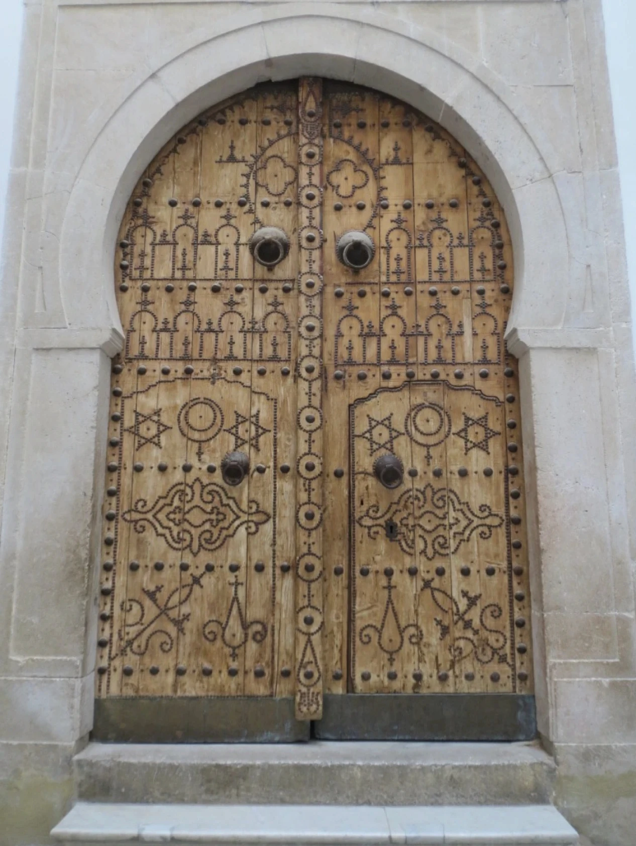 grayscale photo of persons hand