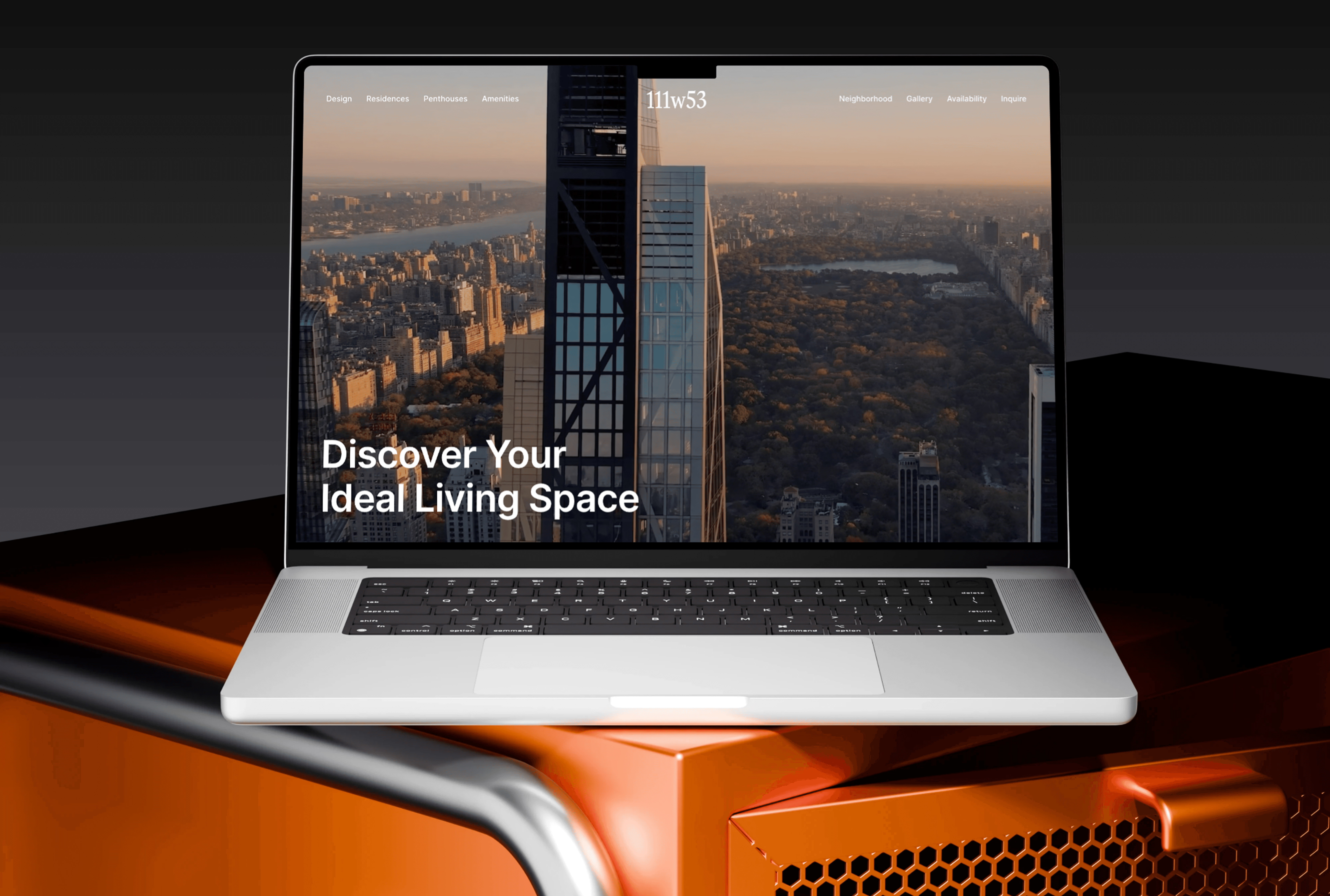 A lone figure stands on a sand dune at sunset.