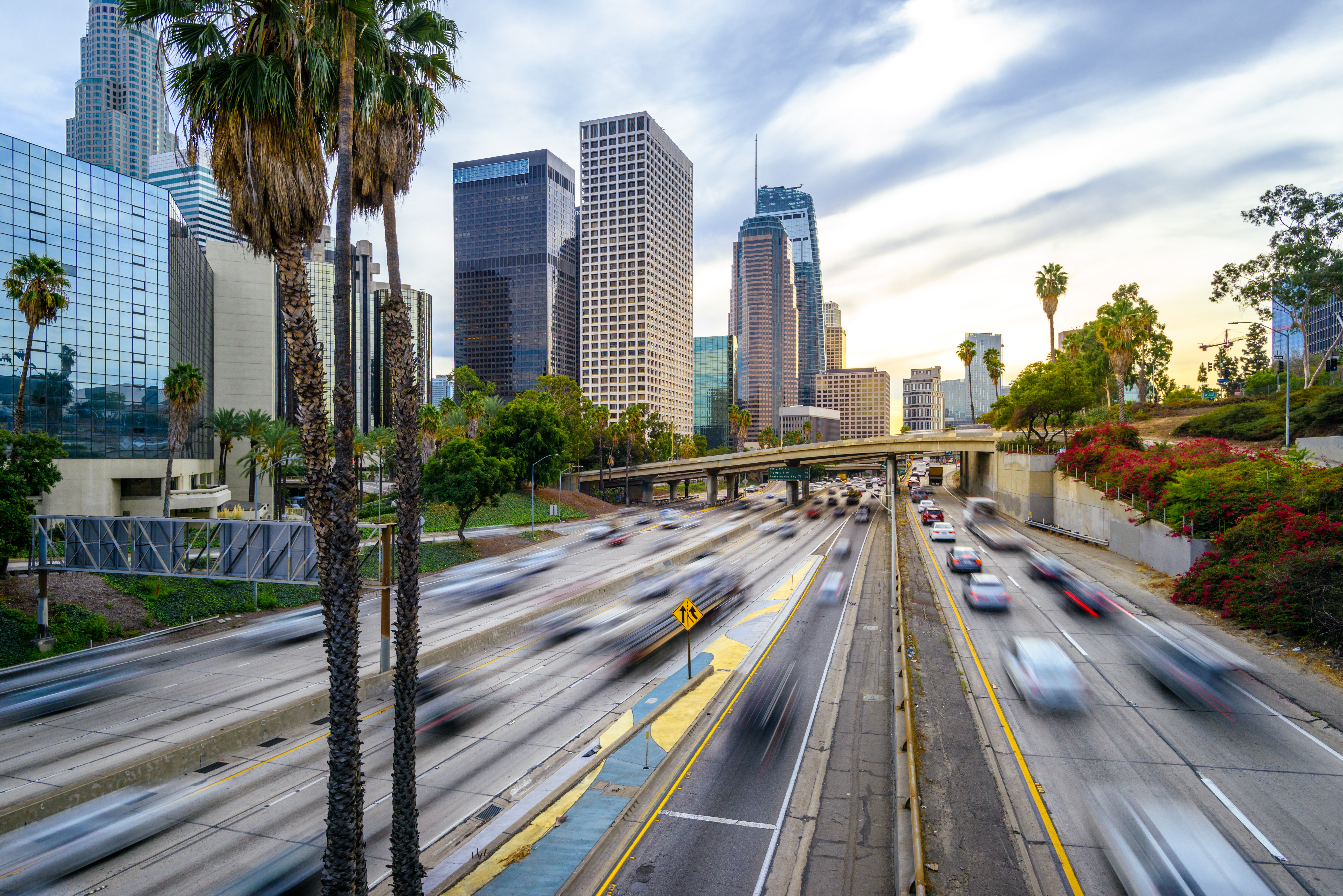 Long exposure photo of an LA highway in motion taken at sunset.