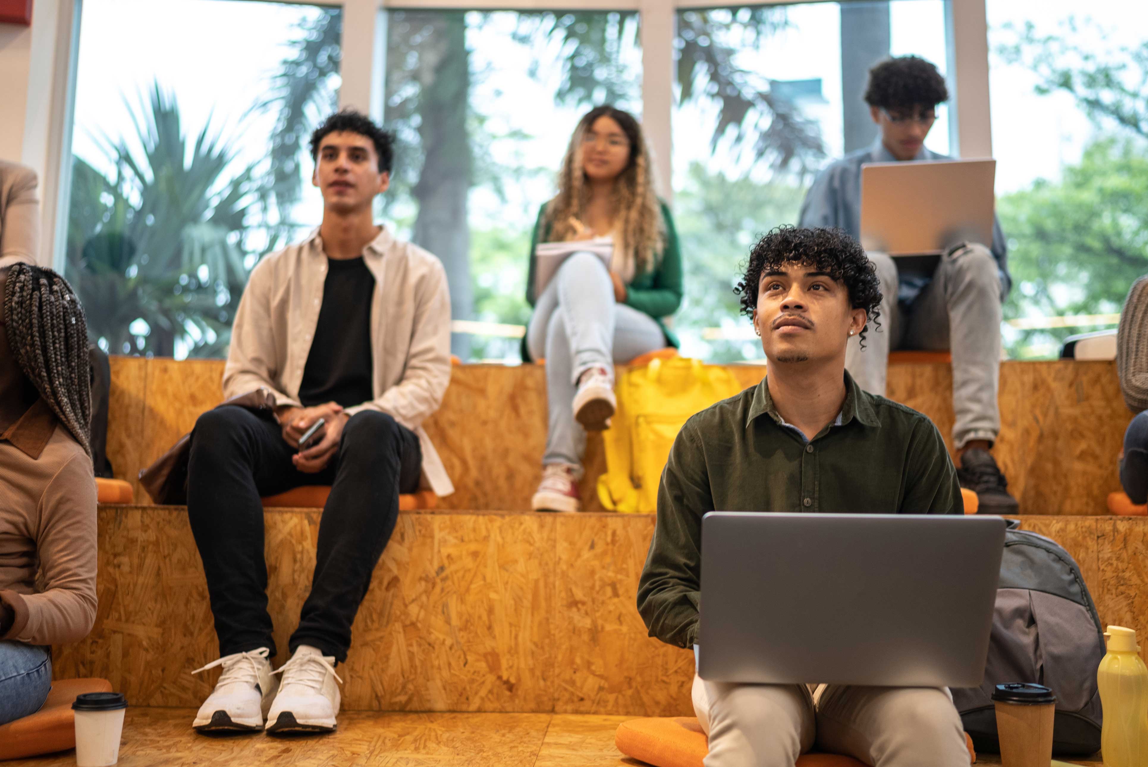 A group of students invested in a lecture