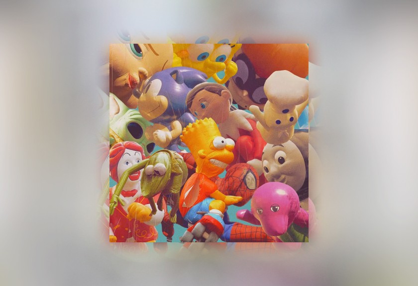 Colorful cartoon scene of Thanksgiving parade balloons featuring classic characters.
