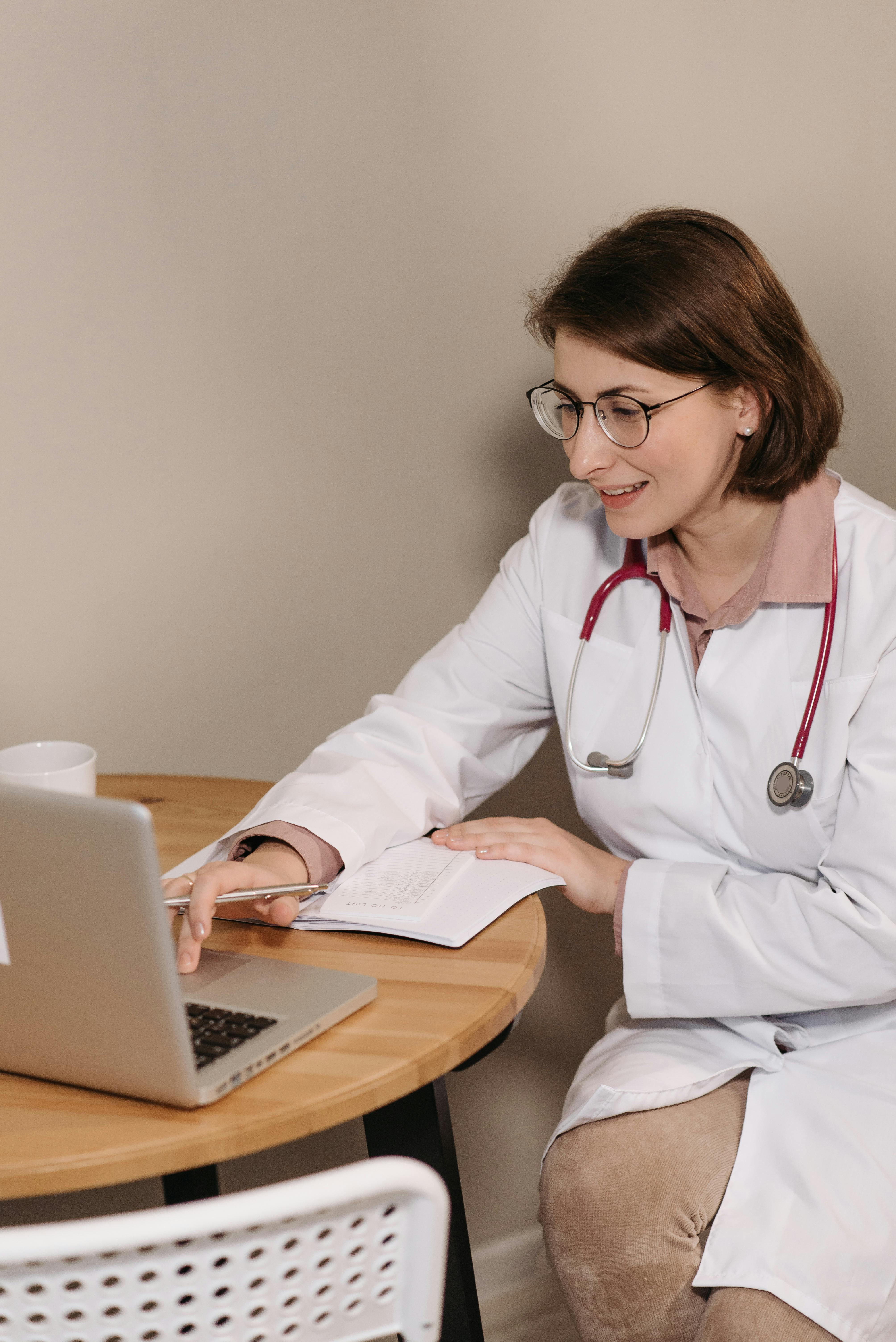Therapist using CompliantChatGPT during an online counseling session to automate client note summaries and generate coping strategies. The tool helps mental health professionals reduce documentation time and focus on patient care.