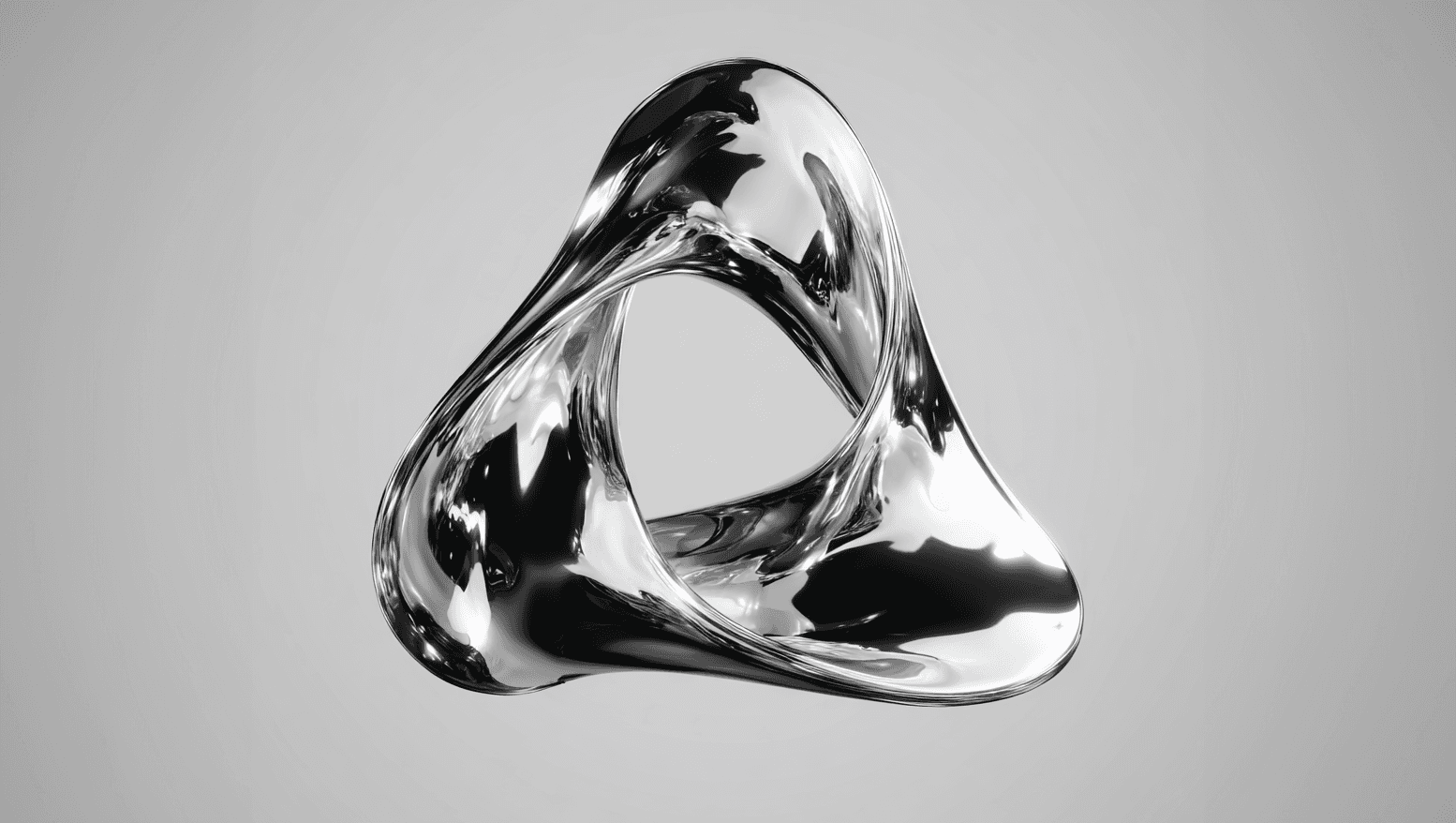 Two colleagues collaborating over paperwork at an office desk, with plants in the background.