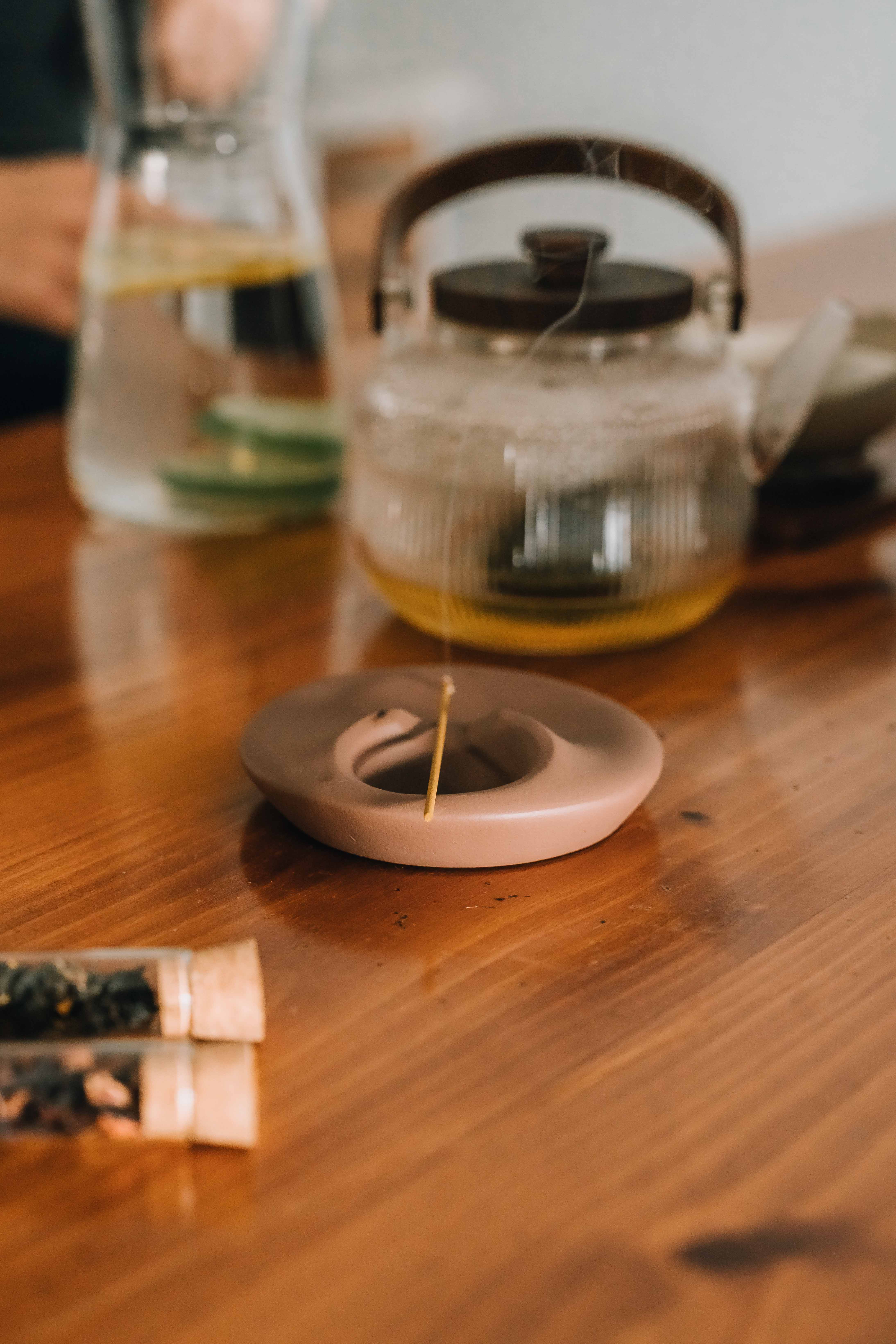 three men and one woman laughing during daytime