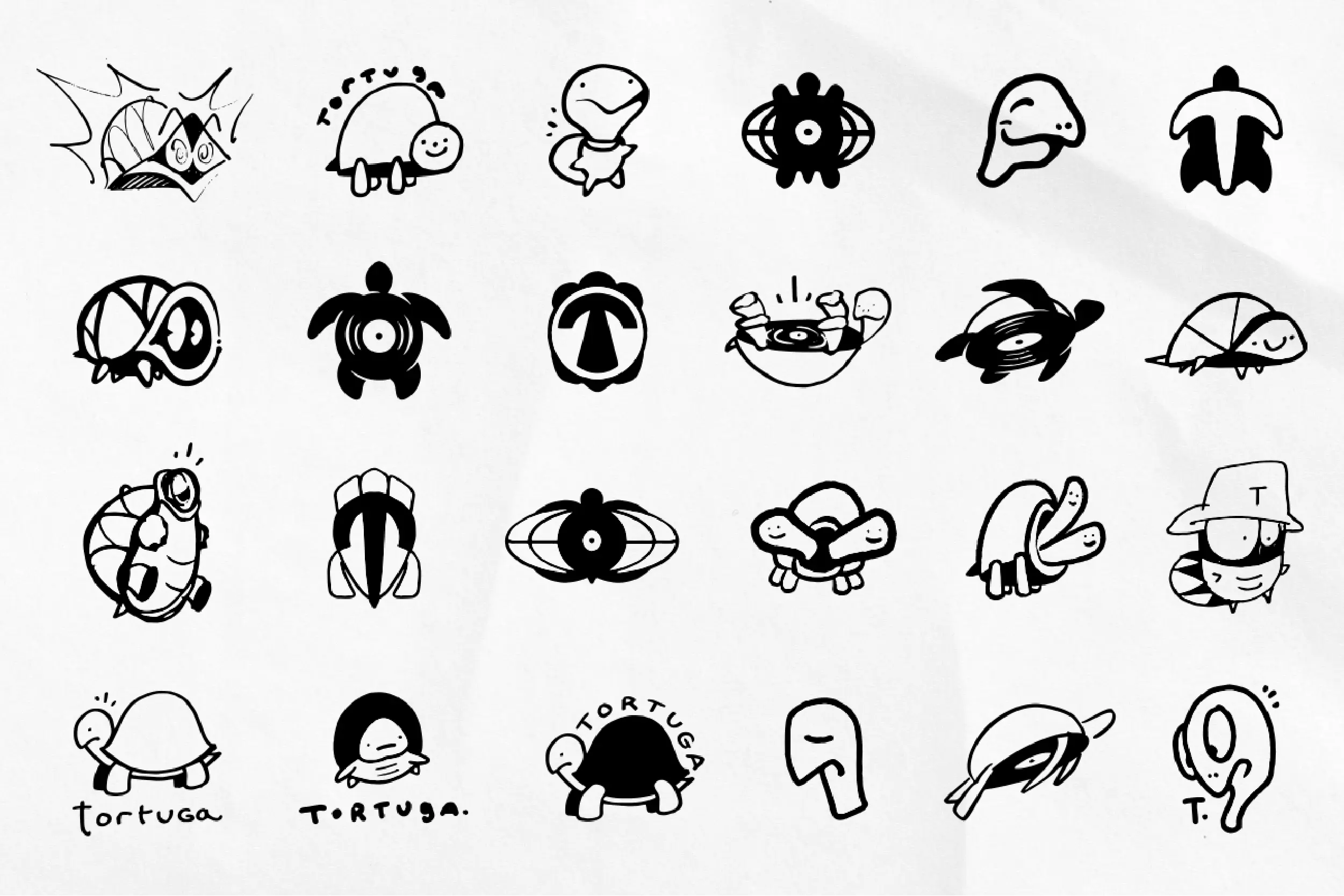 Early black-and-white sketches of turtle icon concepts on textured paper.