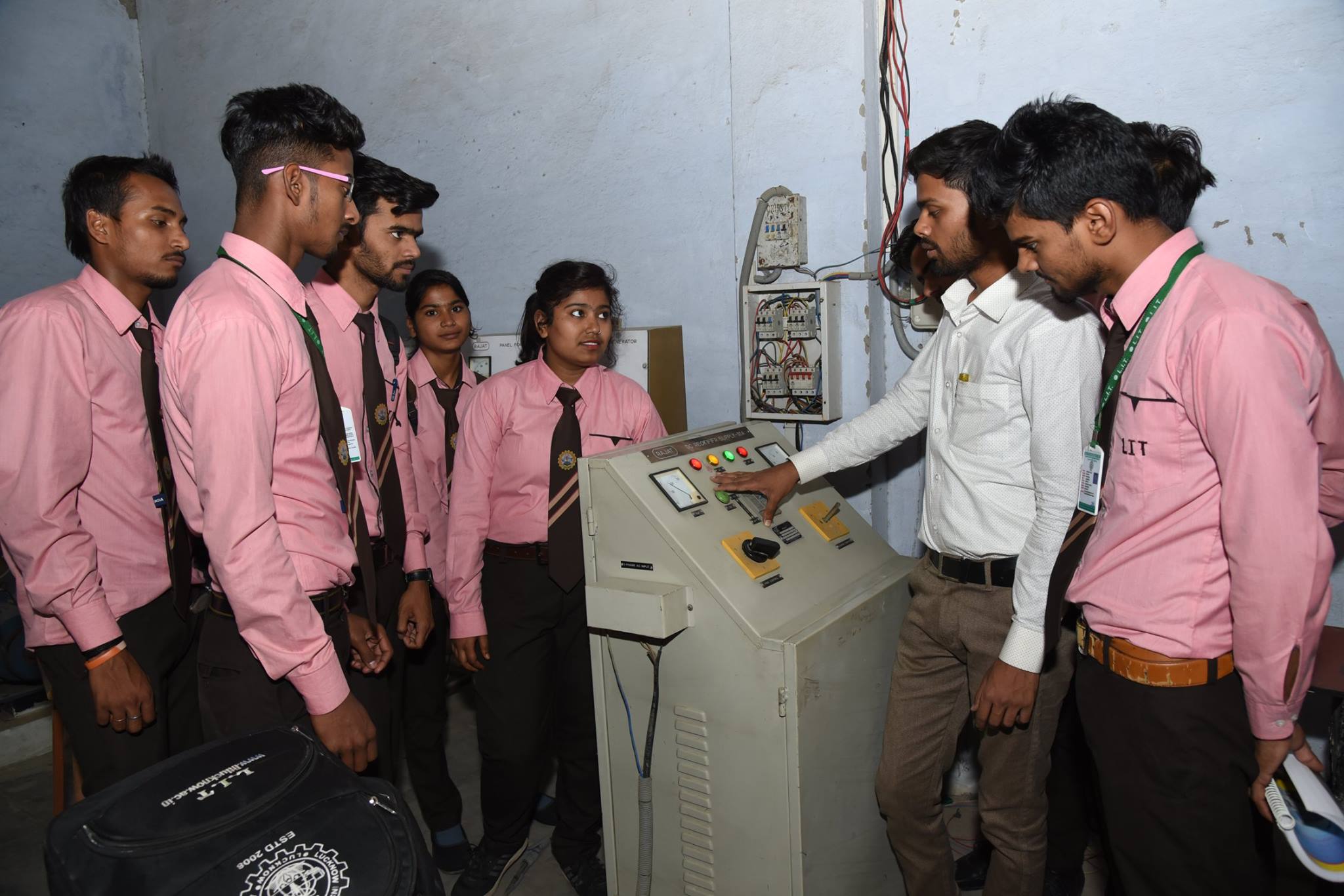 Full moon rising behind a house at night