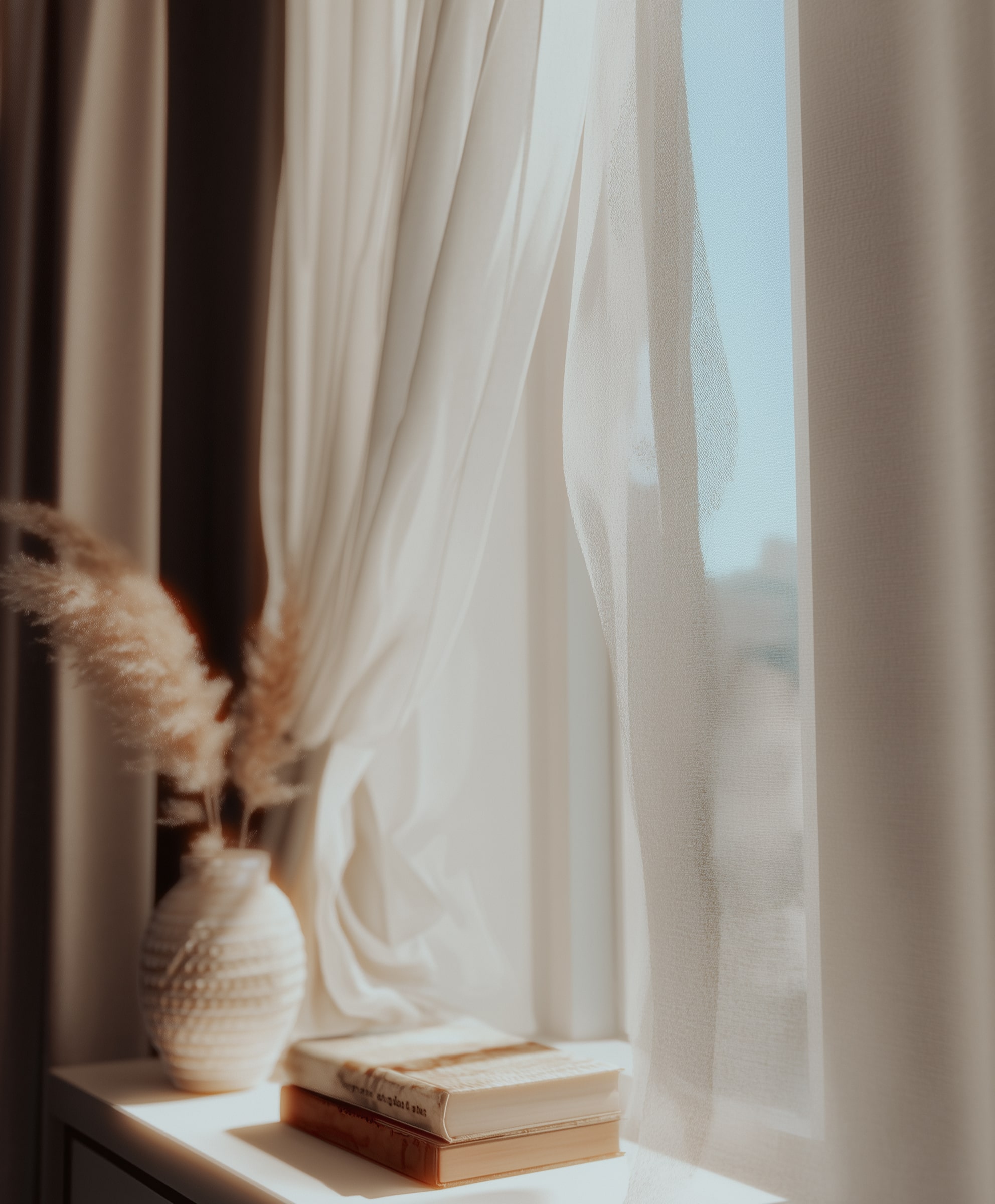 cozy place with beige tone. book on a shelve