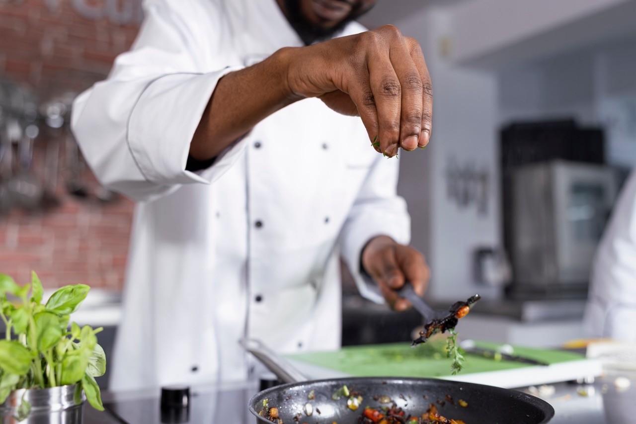 Chef cooking in kitchen