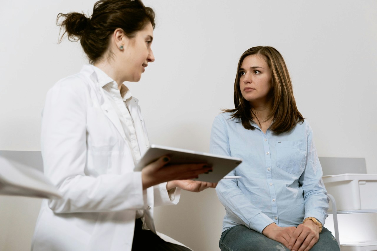 Dentist is taking a patient's review.