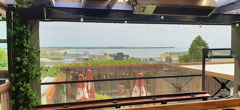 The Vic beer garden overlooking Tramore bay photo