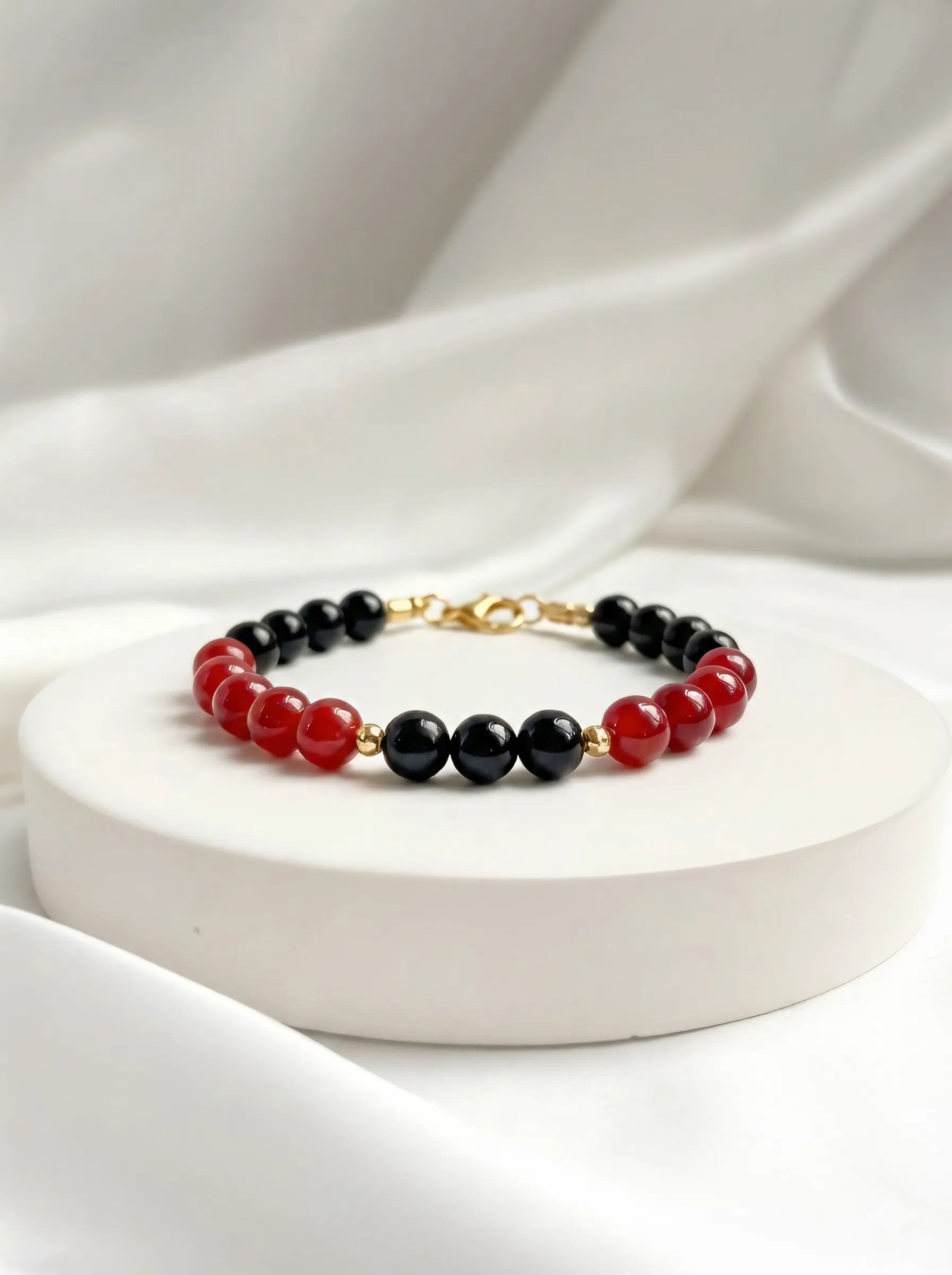 Crimson vitality bracelet in a studio setting.