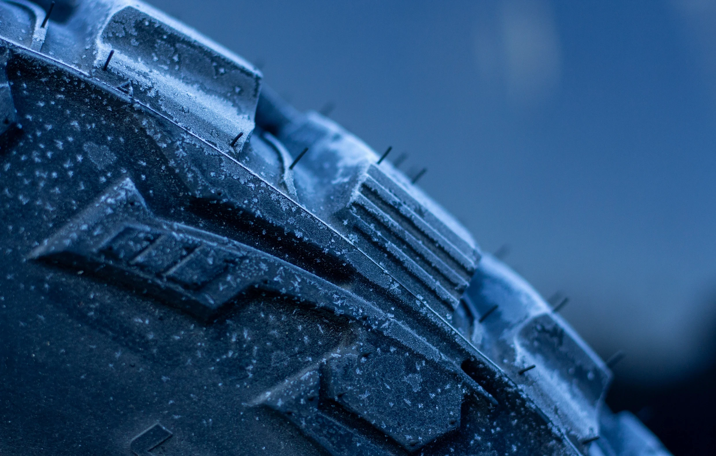 macro image of a car tire with frost on it