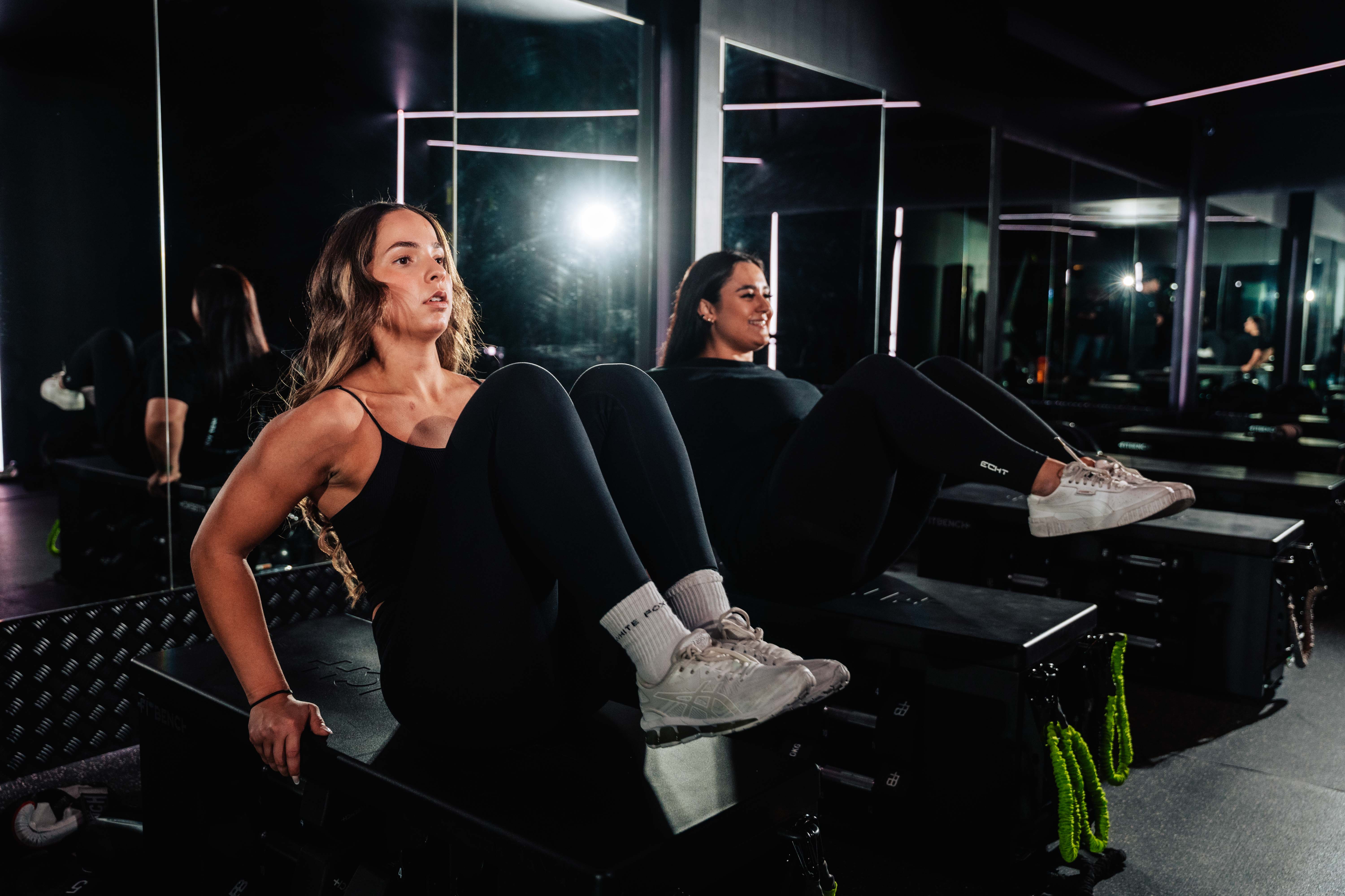 Rachel Stone standing with ABS and hands in her pockets