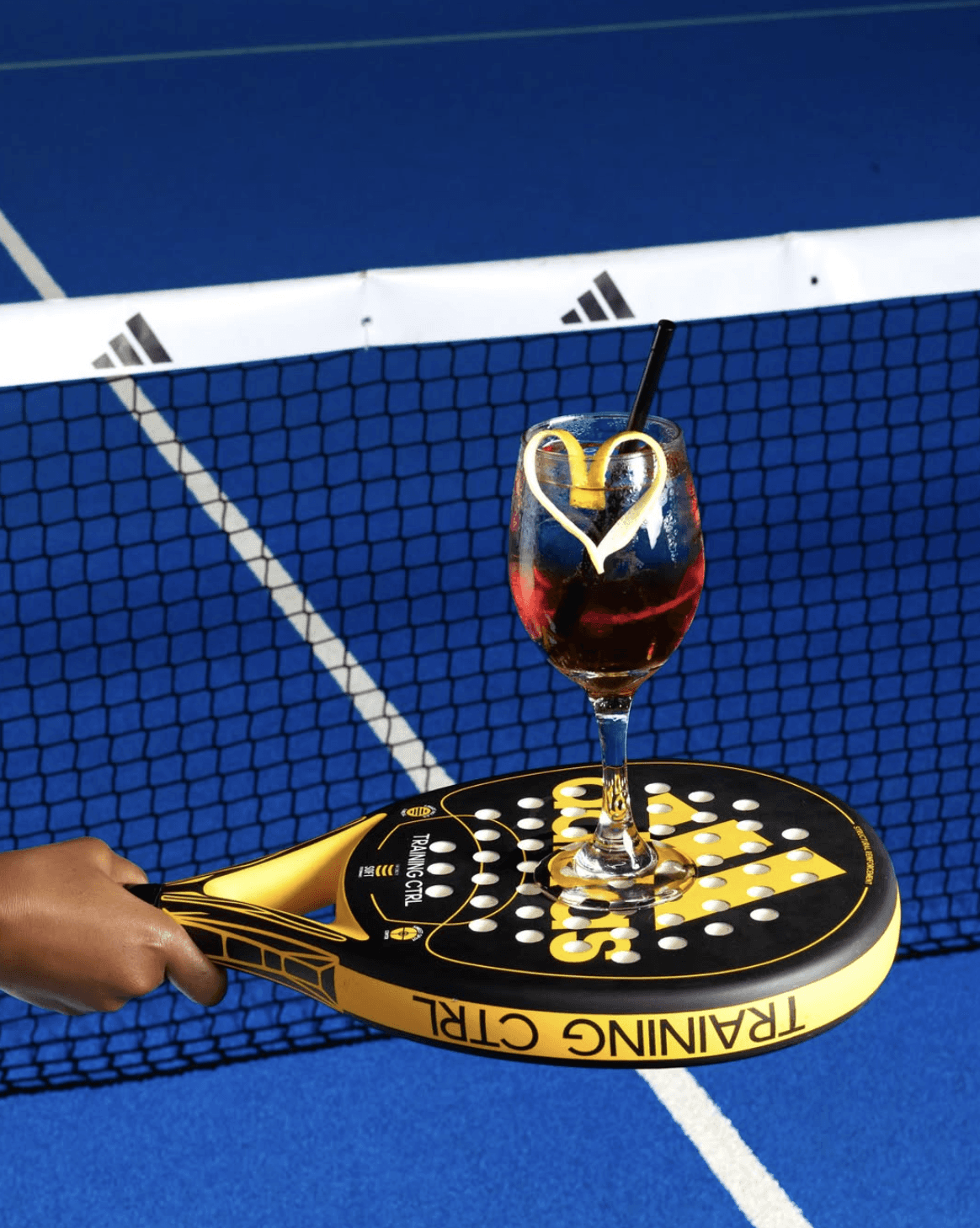 a cocktail on a padel raquet