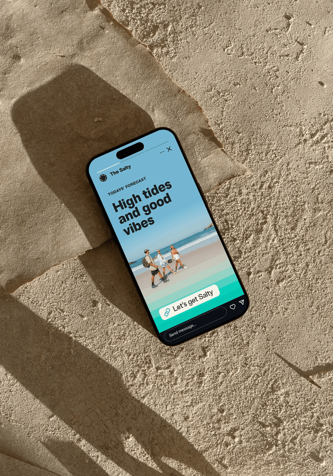 Instagram story layout showing The Salty rebrand: logo, bold headline, and a beach photo background.