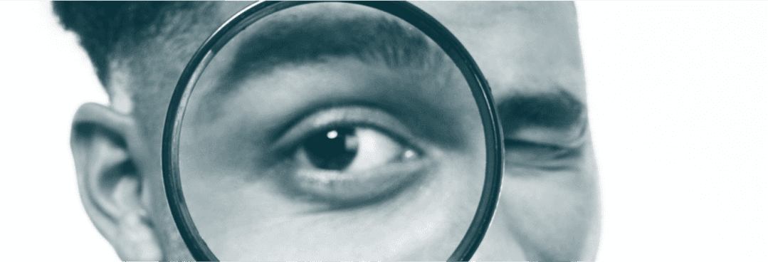 Magnified eyes through a magnifier