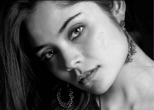 A still lake with mountains in the distance