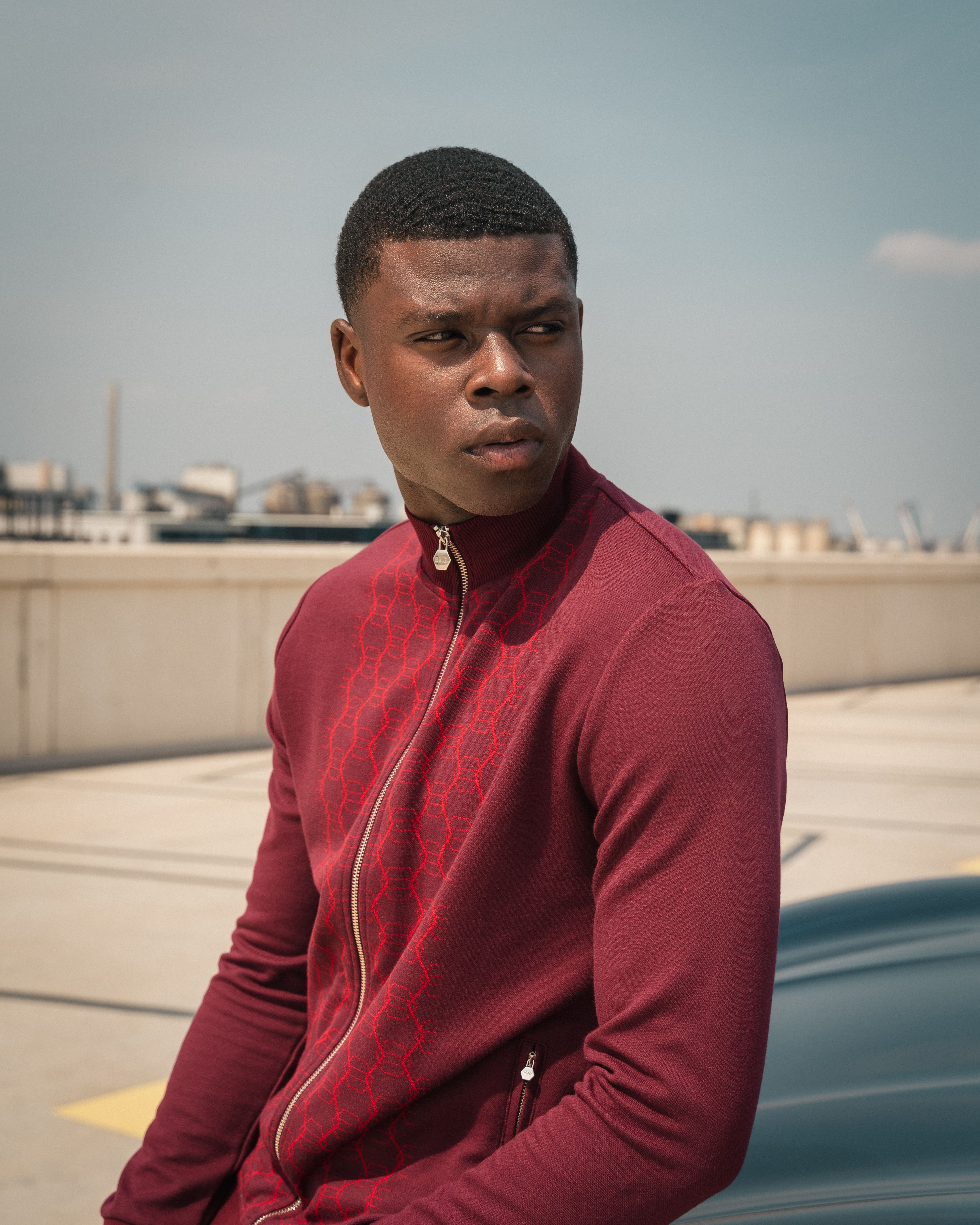 Streetside billboard with flyposters of the Batch.Works brand and illustrations