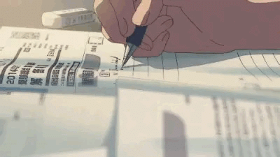 Application paperwork and pen on a wooden table