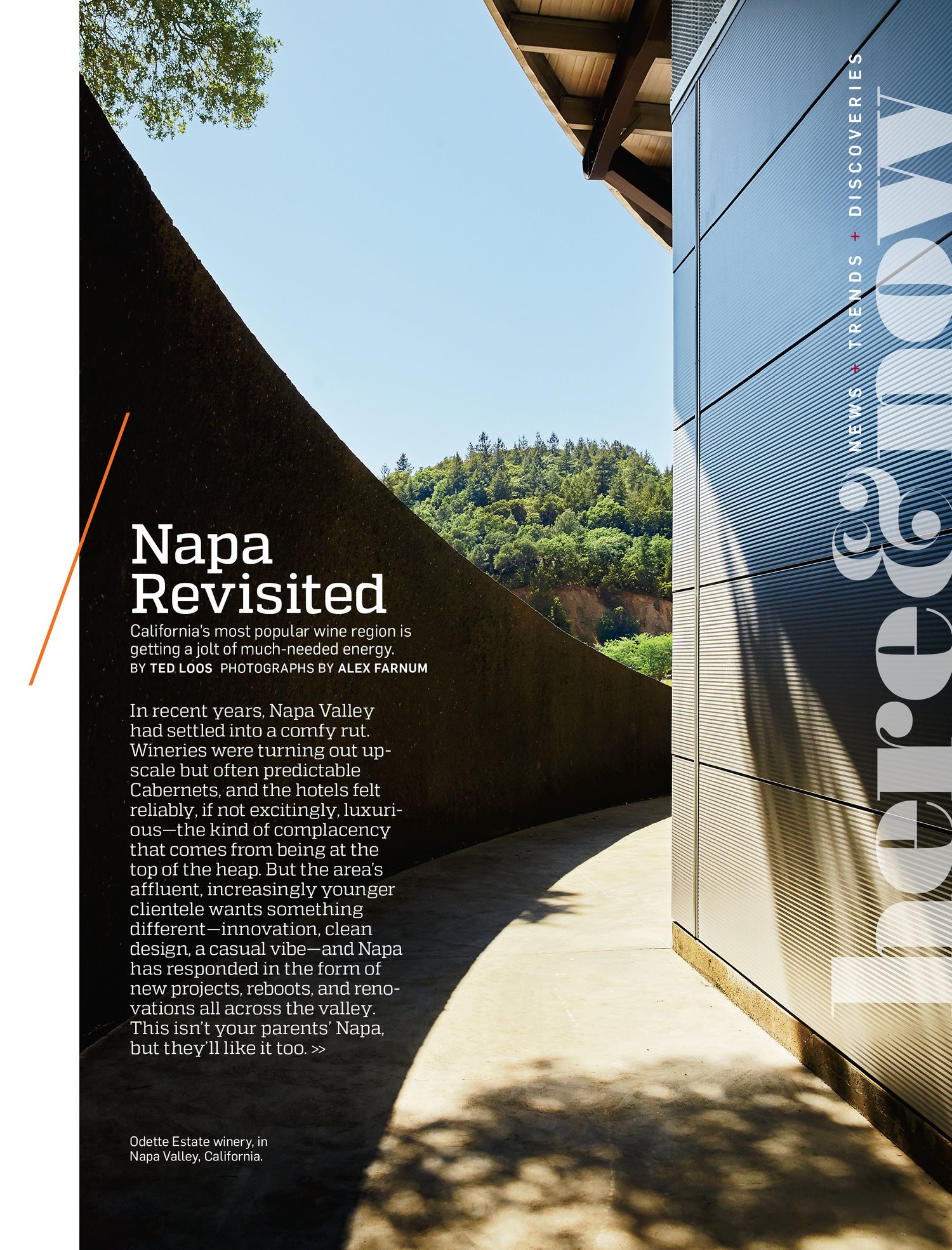 A magazine layout with a photo of an outdoor walkway with one side being a curved wall and the other side a metallic panel wall. 