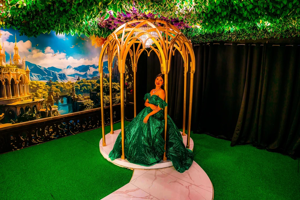 Debutante in an emerald gown inside the gazebo at Pandora Hall, Quezon City