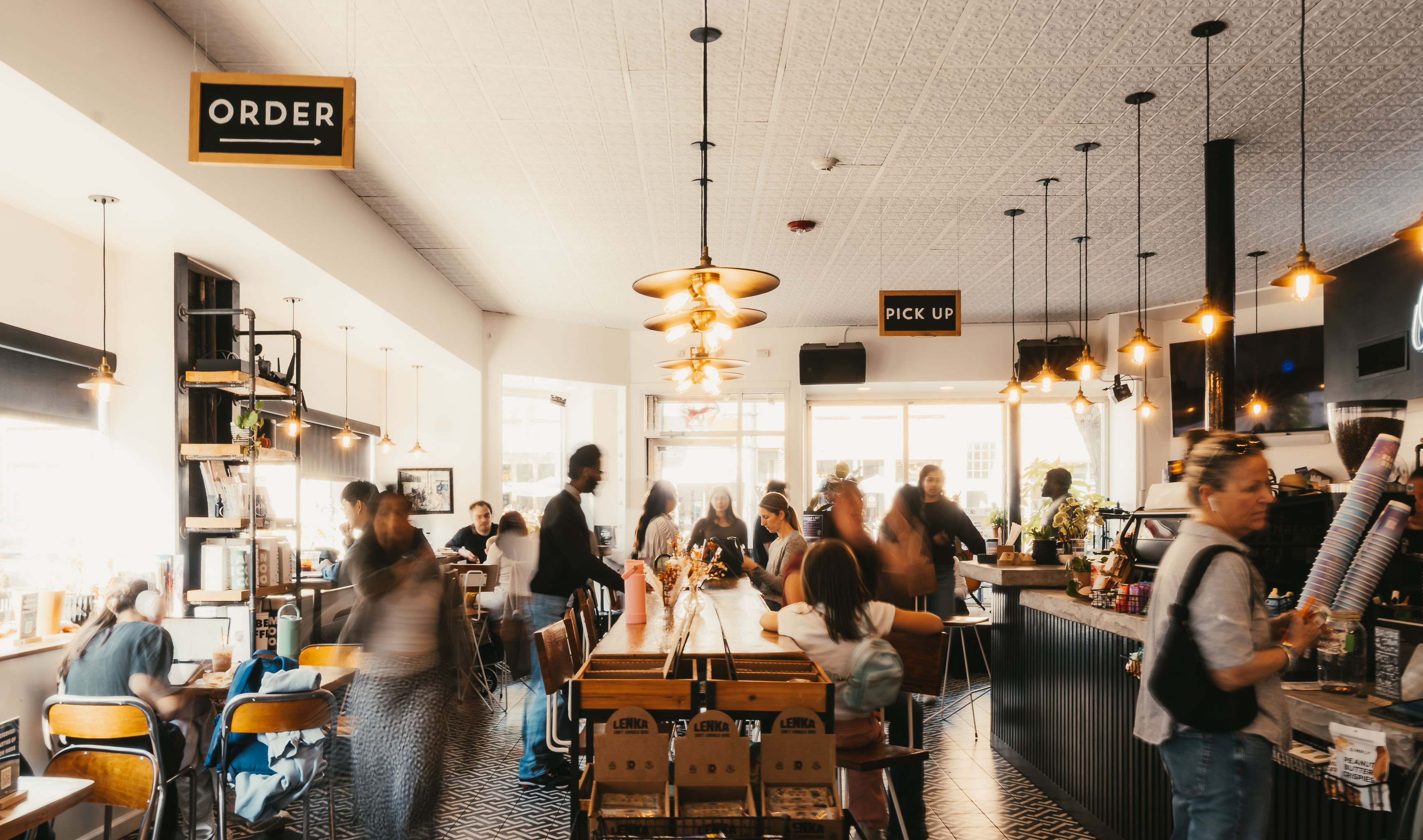 selective focus photography of thee purple ice pops near pine cones