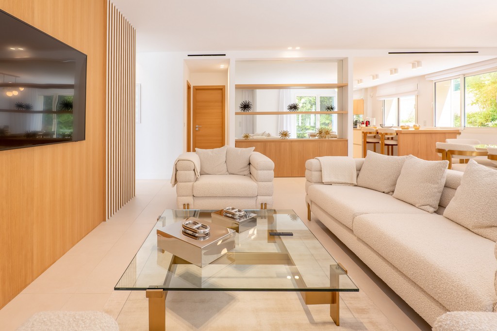 Neutral sofa with cushions and wooden coffee table