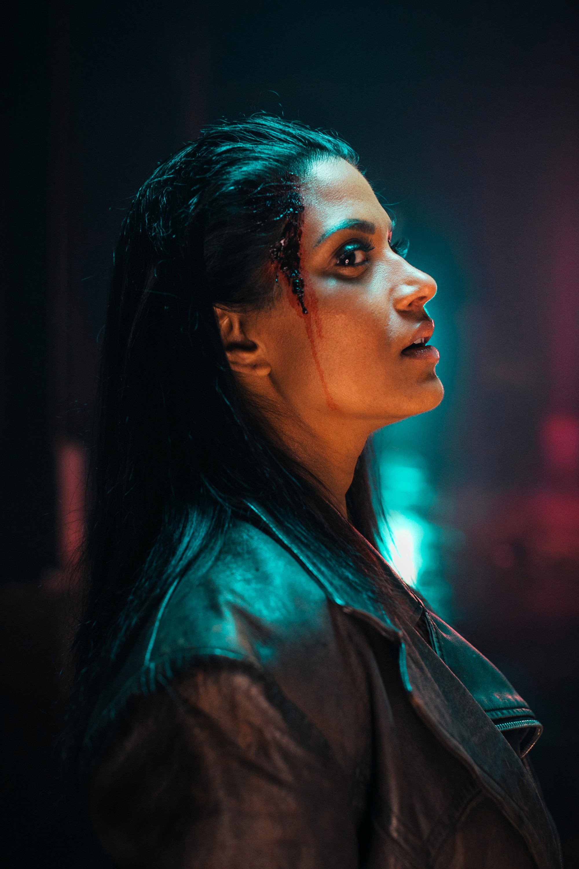 Neon-lit female Broken Trace portrait