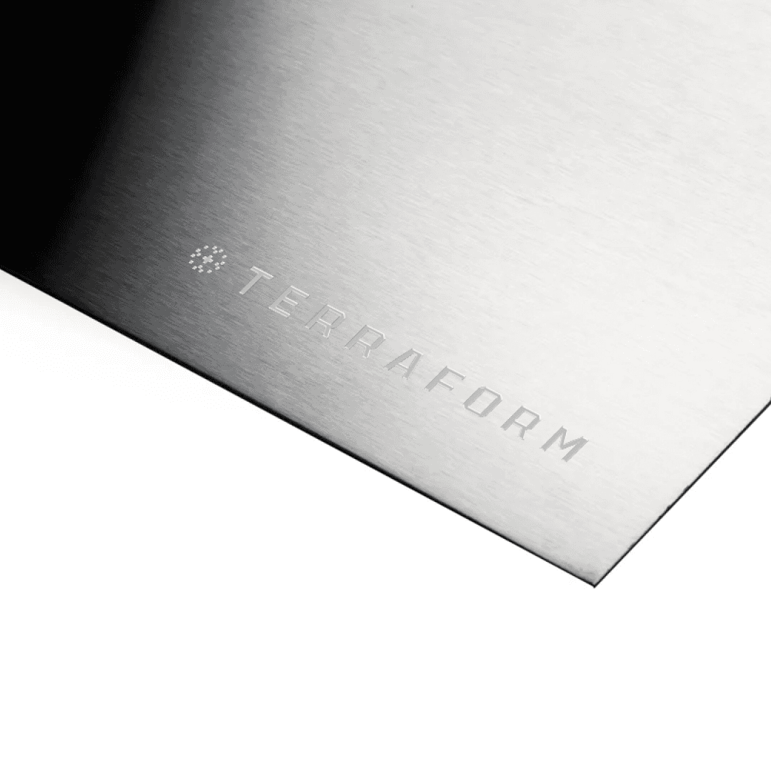 Streetside billboard with flyposters of the Batch.Works brand and illustrations