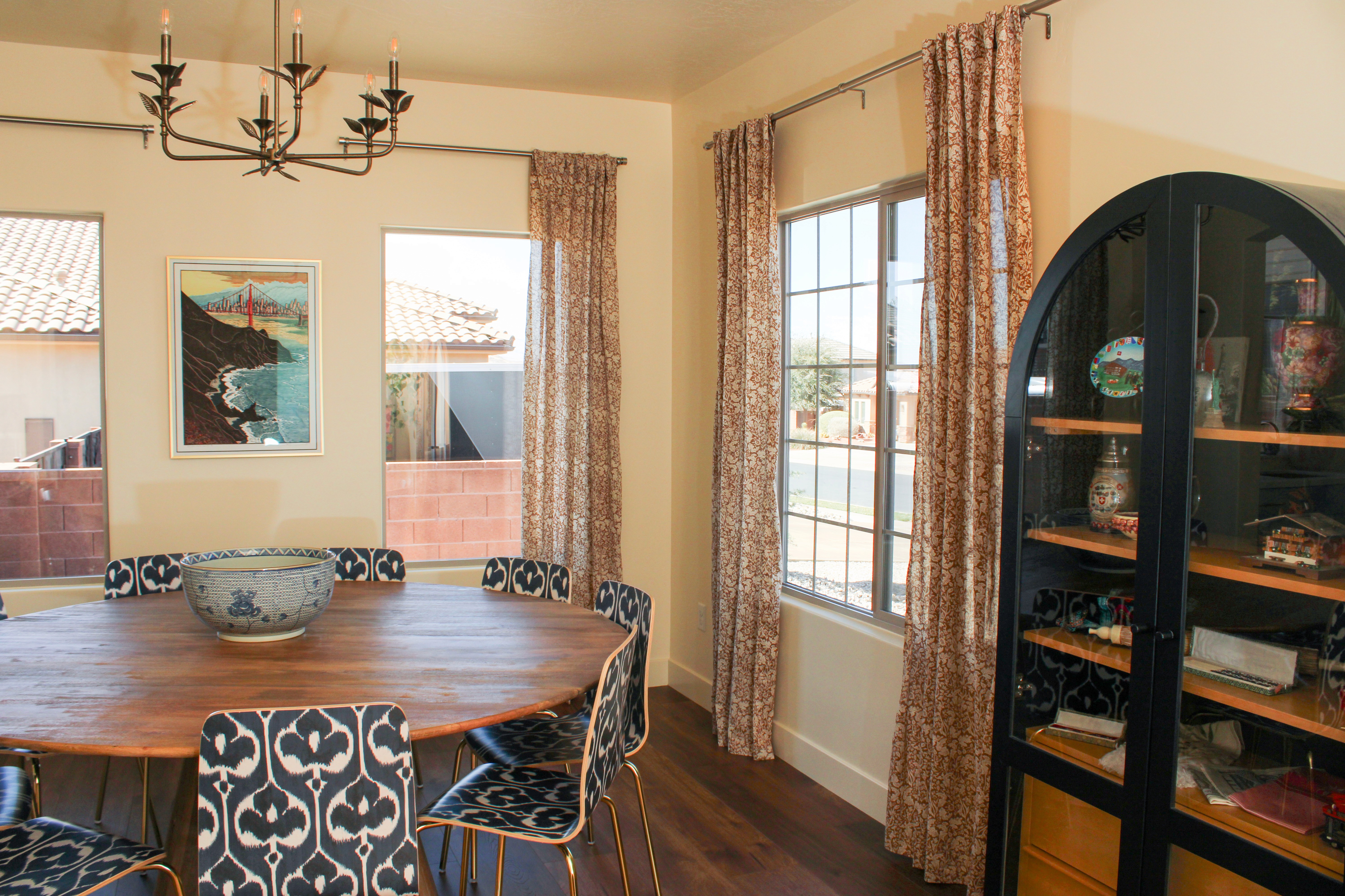 Formal dining room in a Washington, Utah home with elegant design and light-filled windows