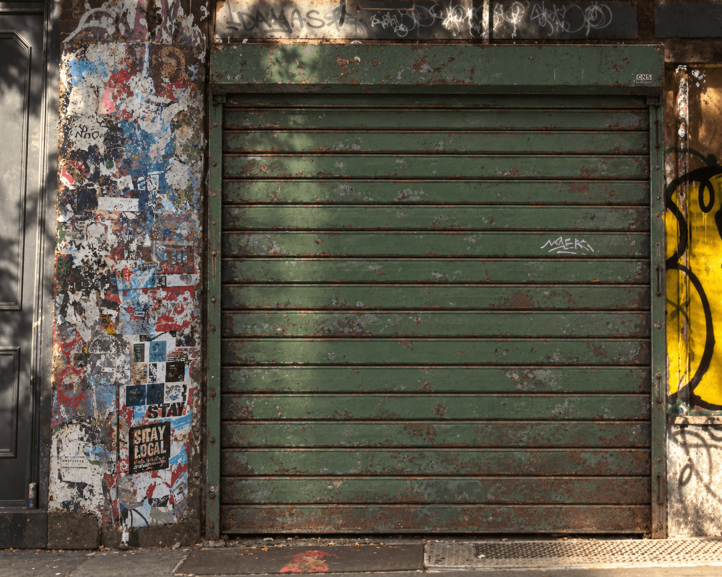 Original green metal gallery roller shutter
