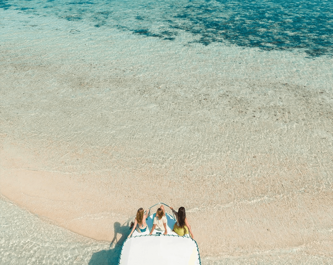Two woman in front of a boat in El Nido cruising the big lagoon.