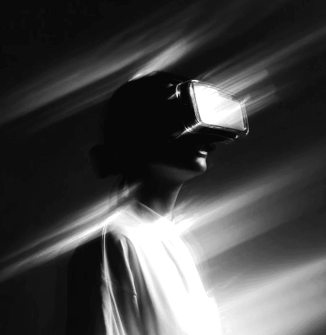 Portrait of a woman with digital pixelation and glitch effect over her face.