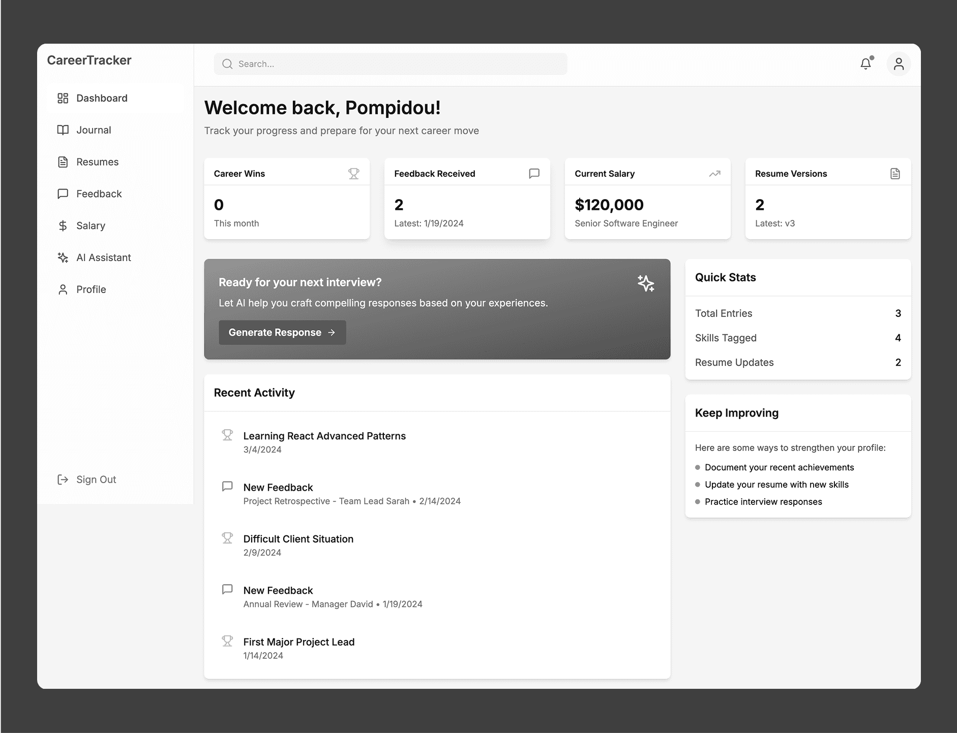 two cell phones on a gray surface