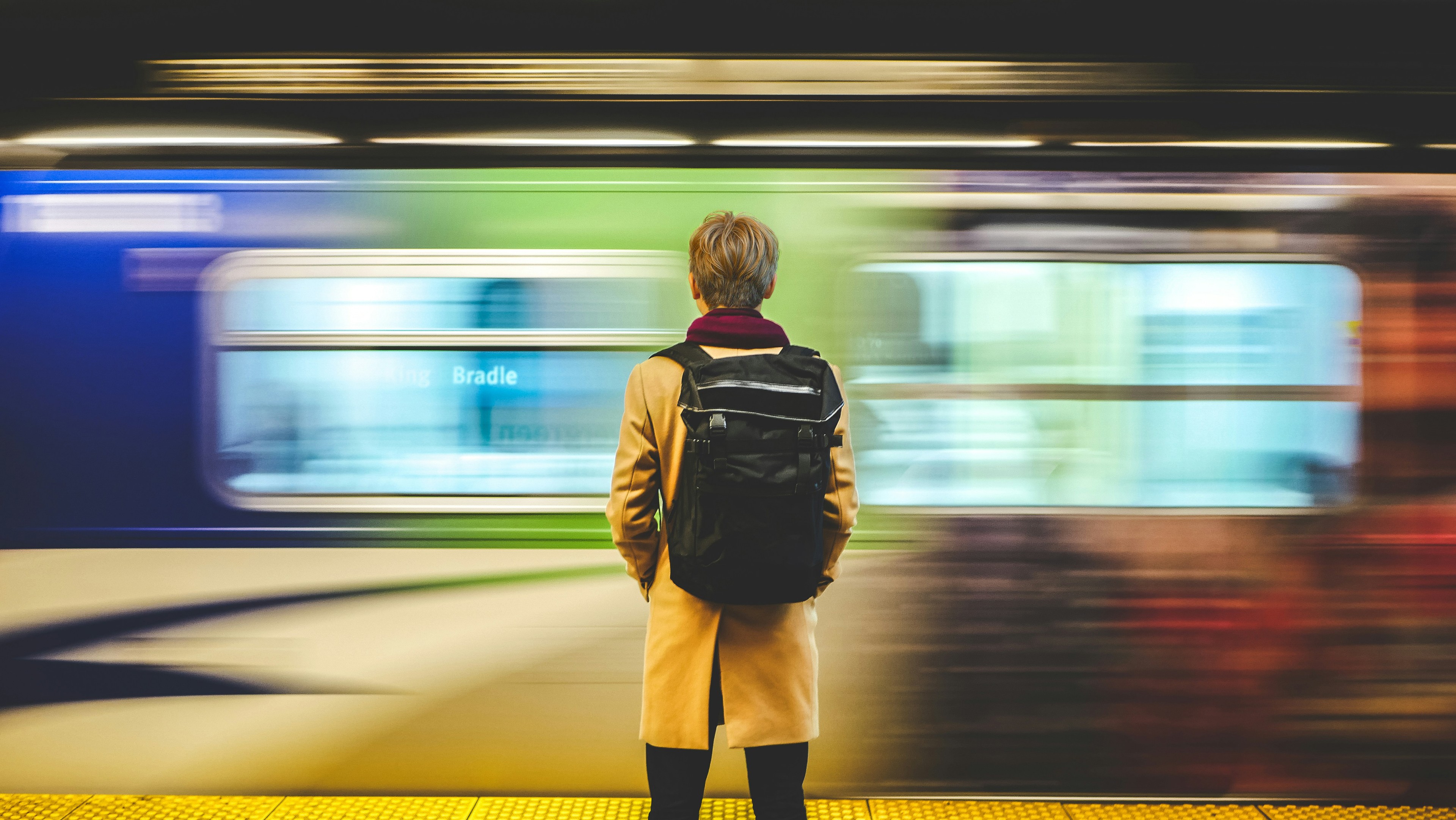 man wearing black backpack
