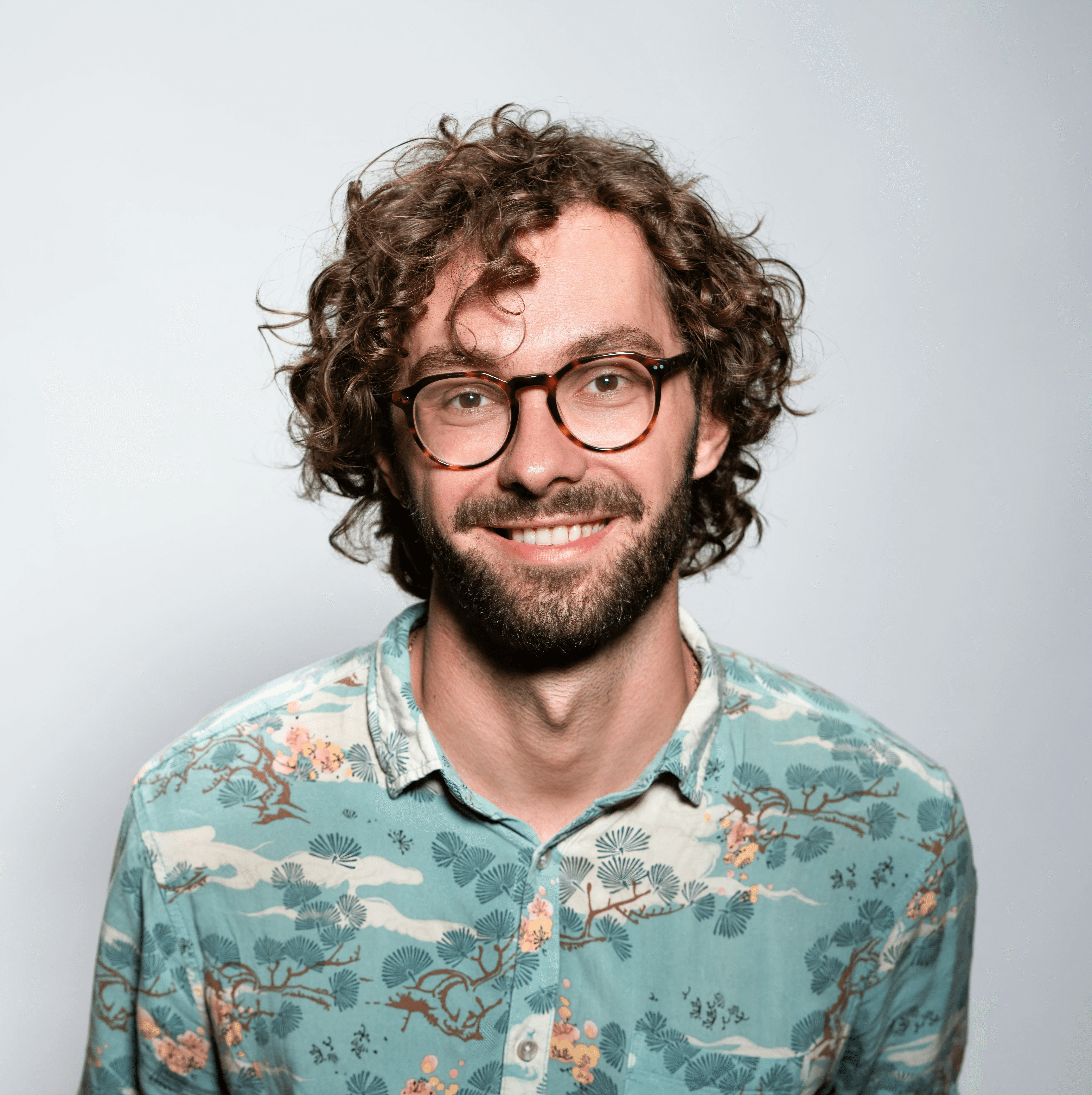 men's blue and white button-up collared top