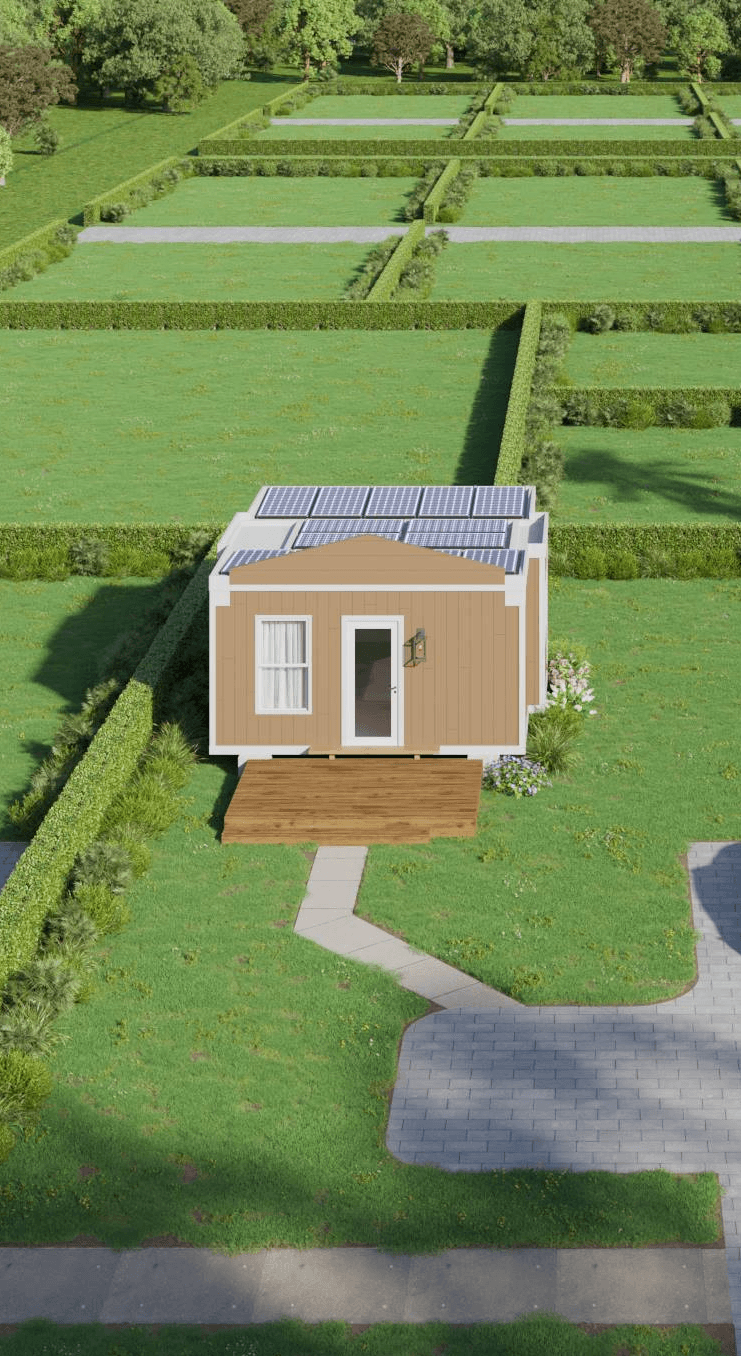 Compact factory-built backyard ADU placed in a grassy residential yard with pathway access.