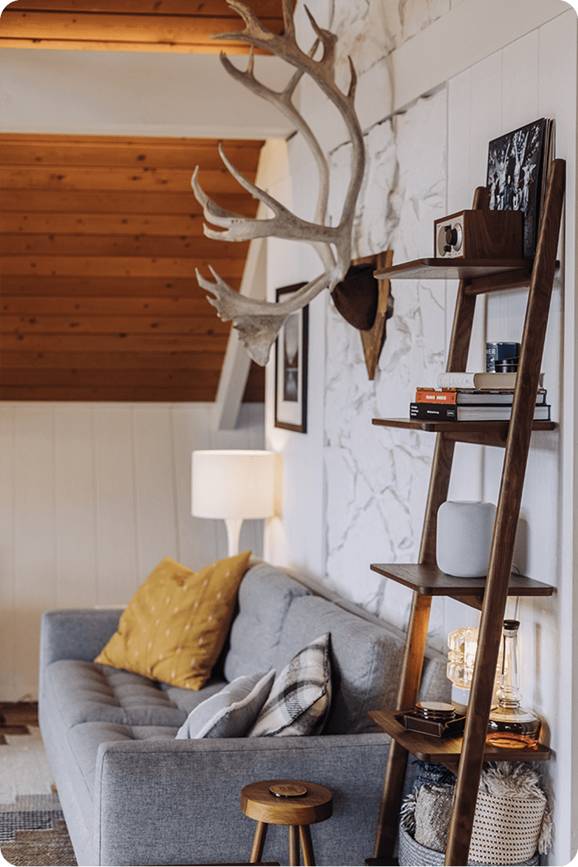 Luxurious marble shower with built-in niche, hexagon mosaic floor tiles, and natural light from Floor & Decor