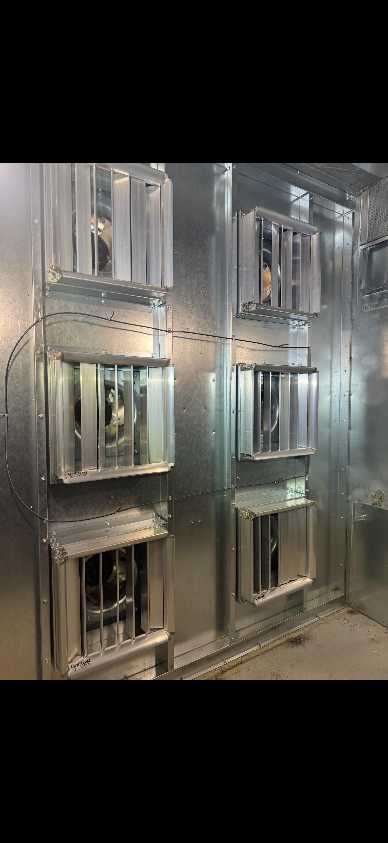 Completed fan array mounting section inside a modernized hospital air handling unit.