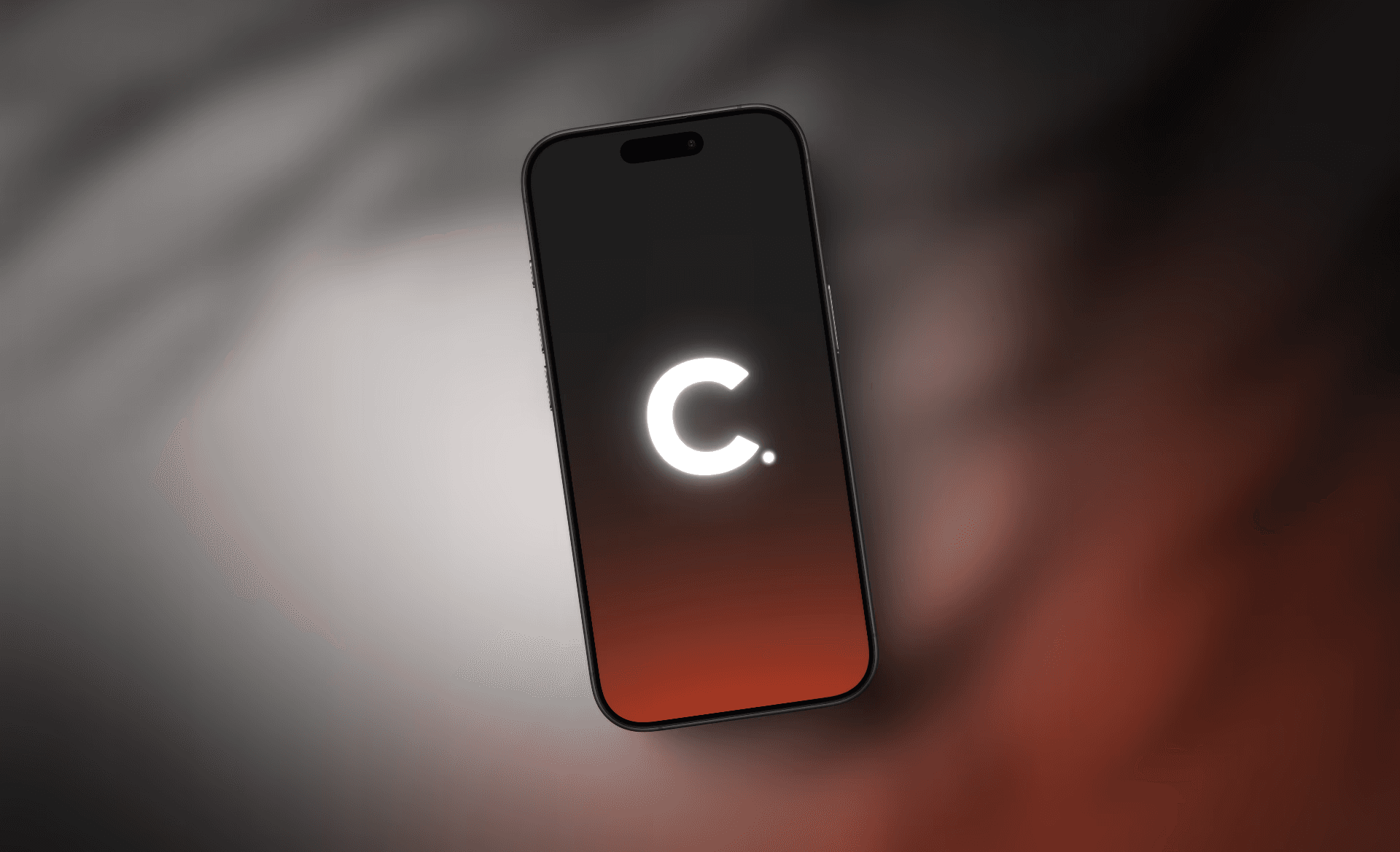 An iPhone mockup of Caima's C logo with an dark orange background