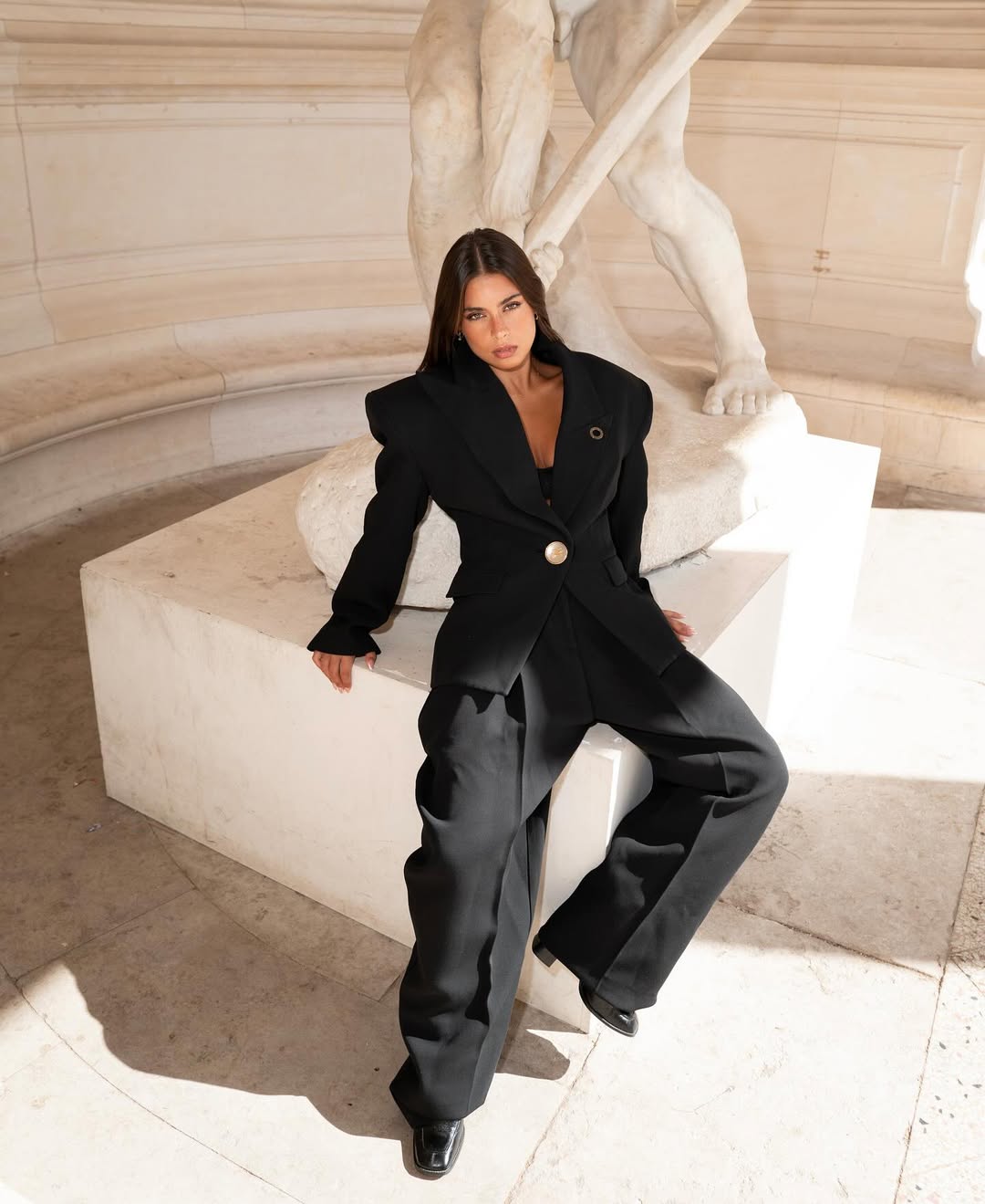 jade Gattoni in front of a statue