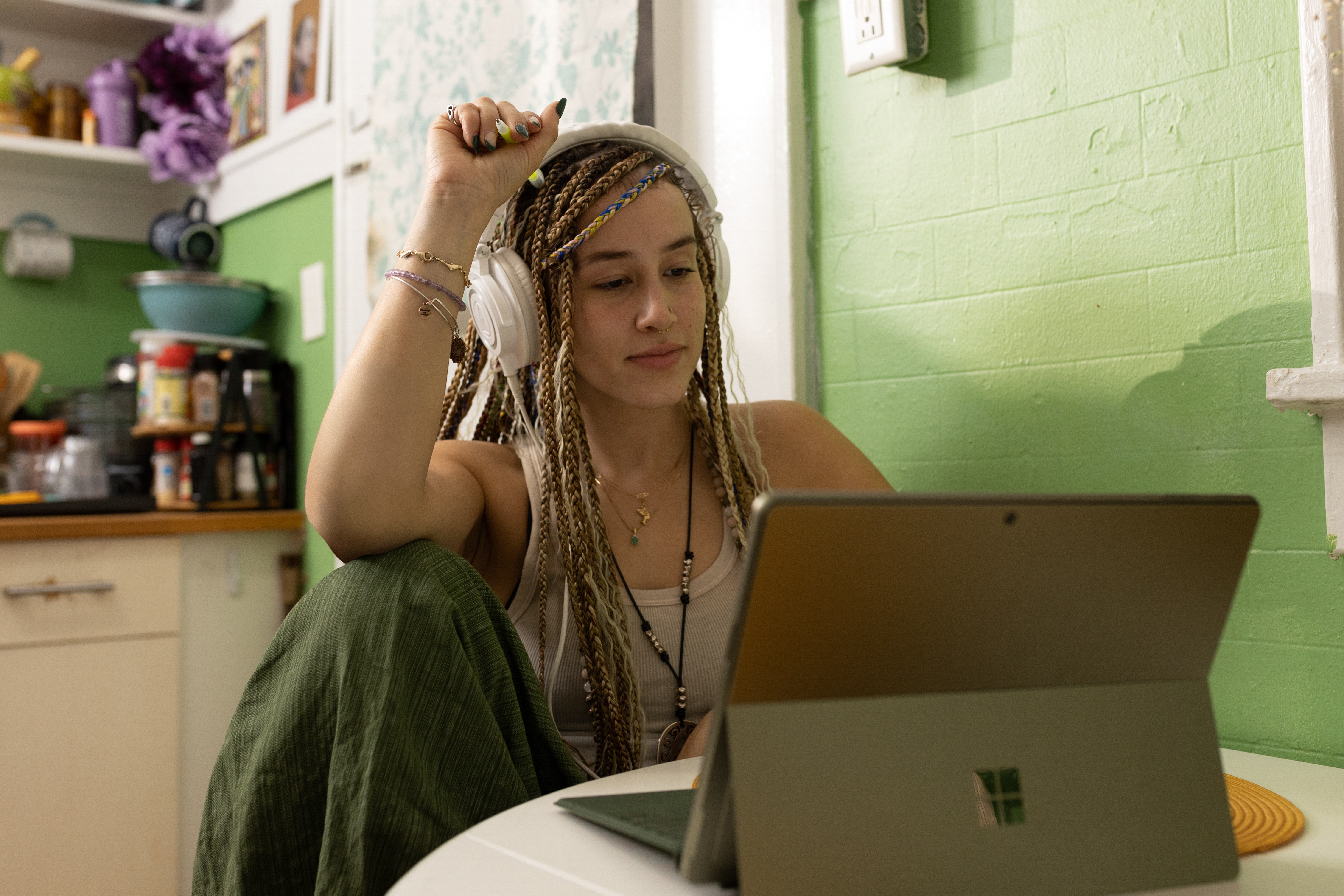 Woman listening to Musicfy's Text to Voice Generator