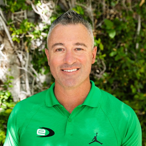 Sara is a client smiling to the camera happily