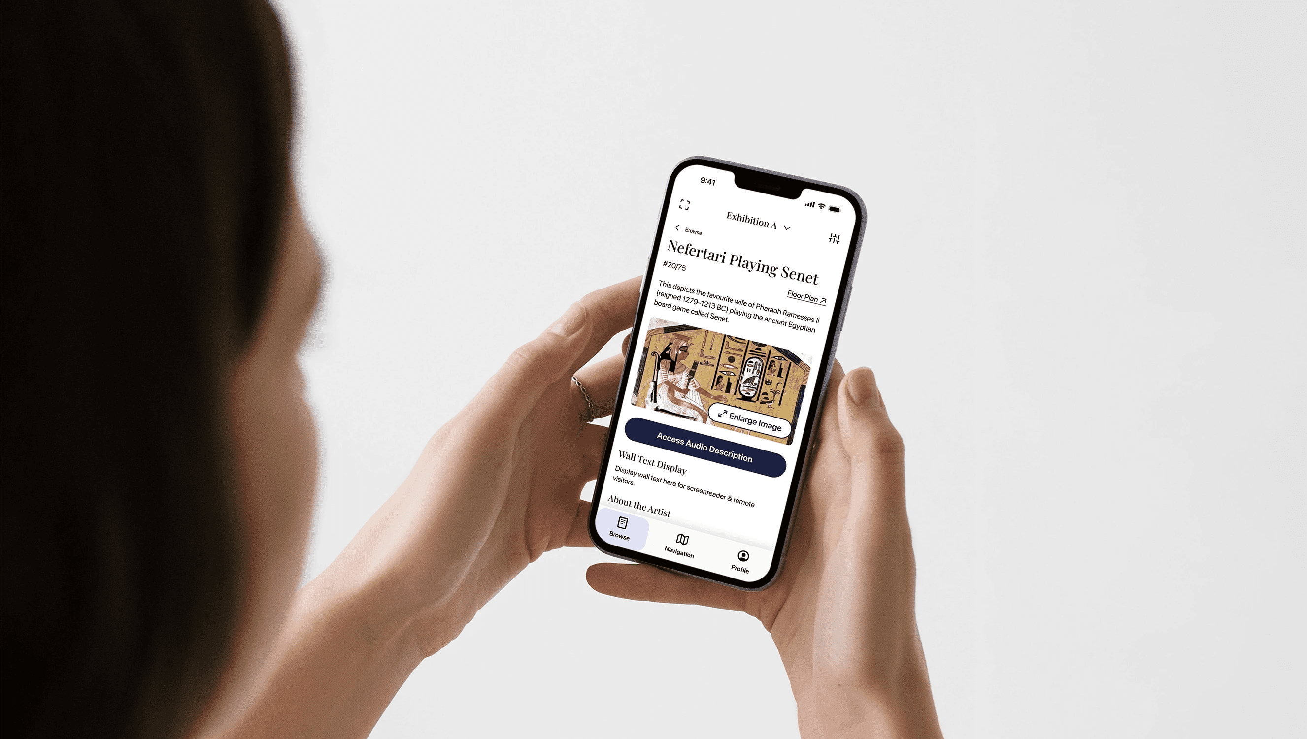 A person holds a smartphone displaying an article titled "Nefertari Playing Senet" with an ancient Egyptian artwork. The background is plain white.