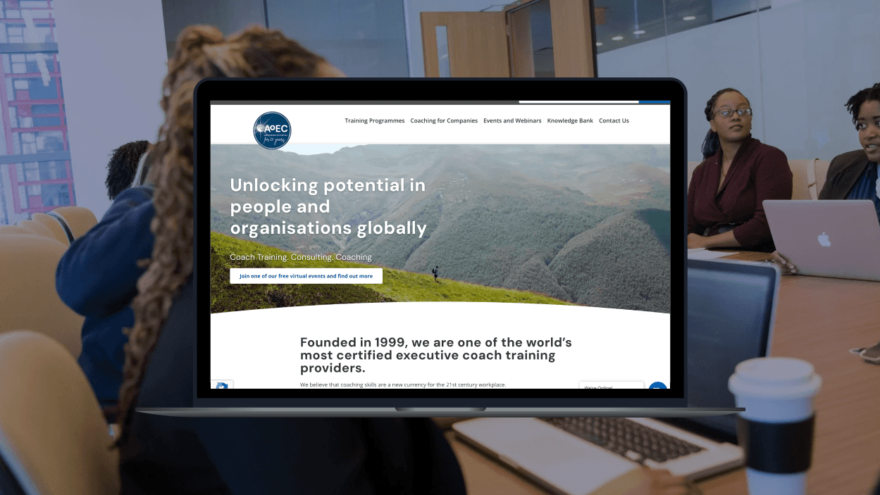 Laptop mockup with a screenshot from The Academy of Executive Coaching Website