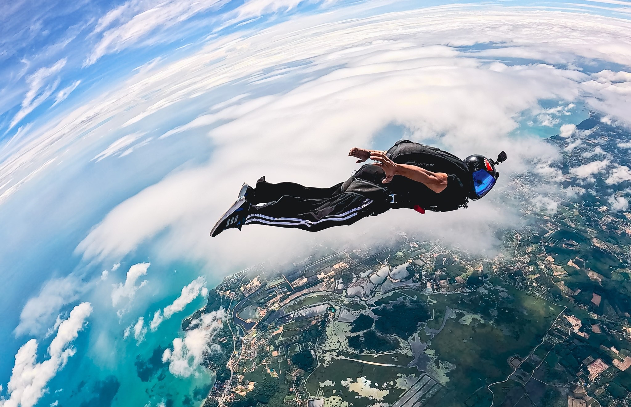 Skydiver in tracking position flying at angle