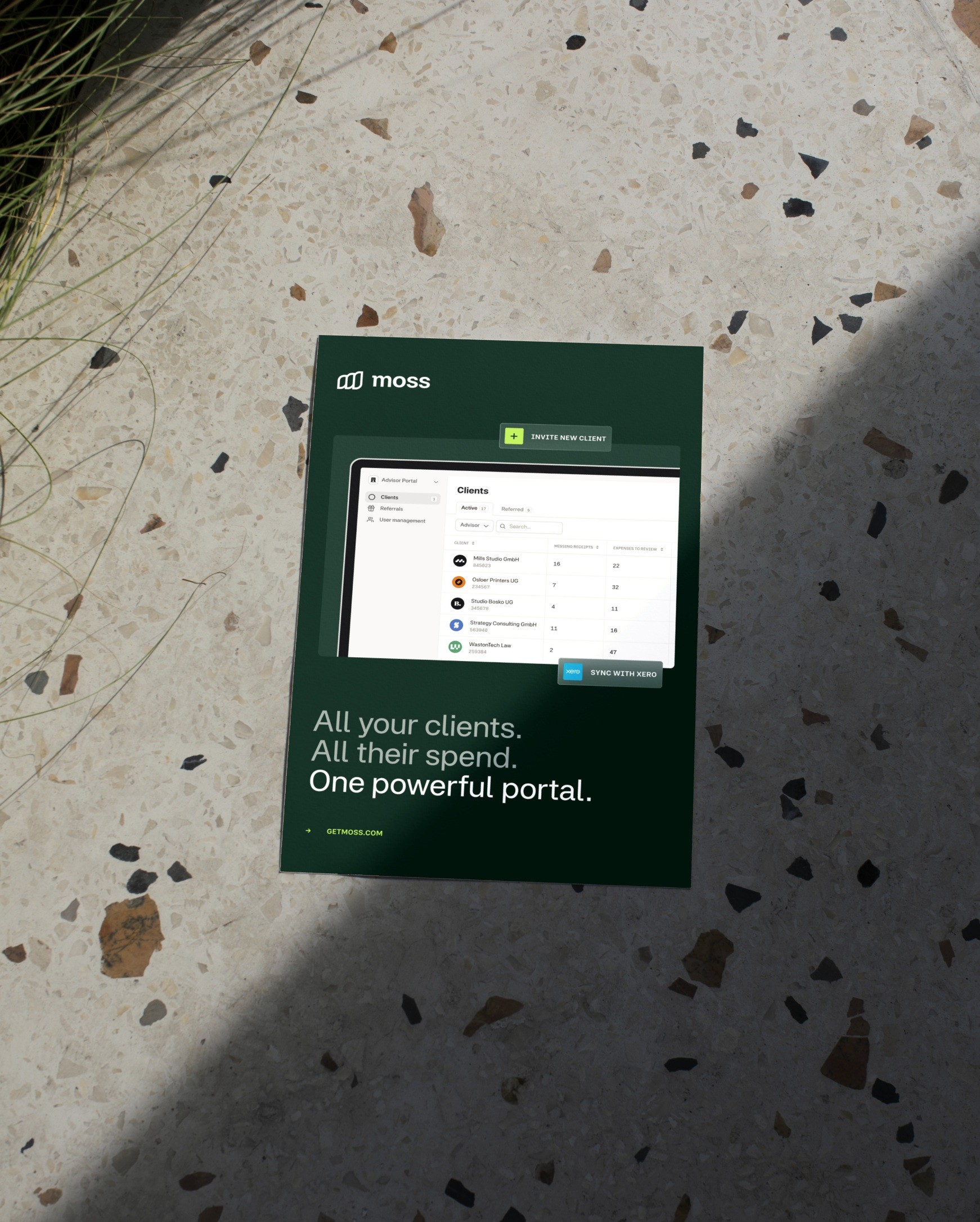 Moss poster reading All your clients. All their spend. One powerful portal. photographed on a terrazzo floor