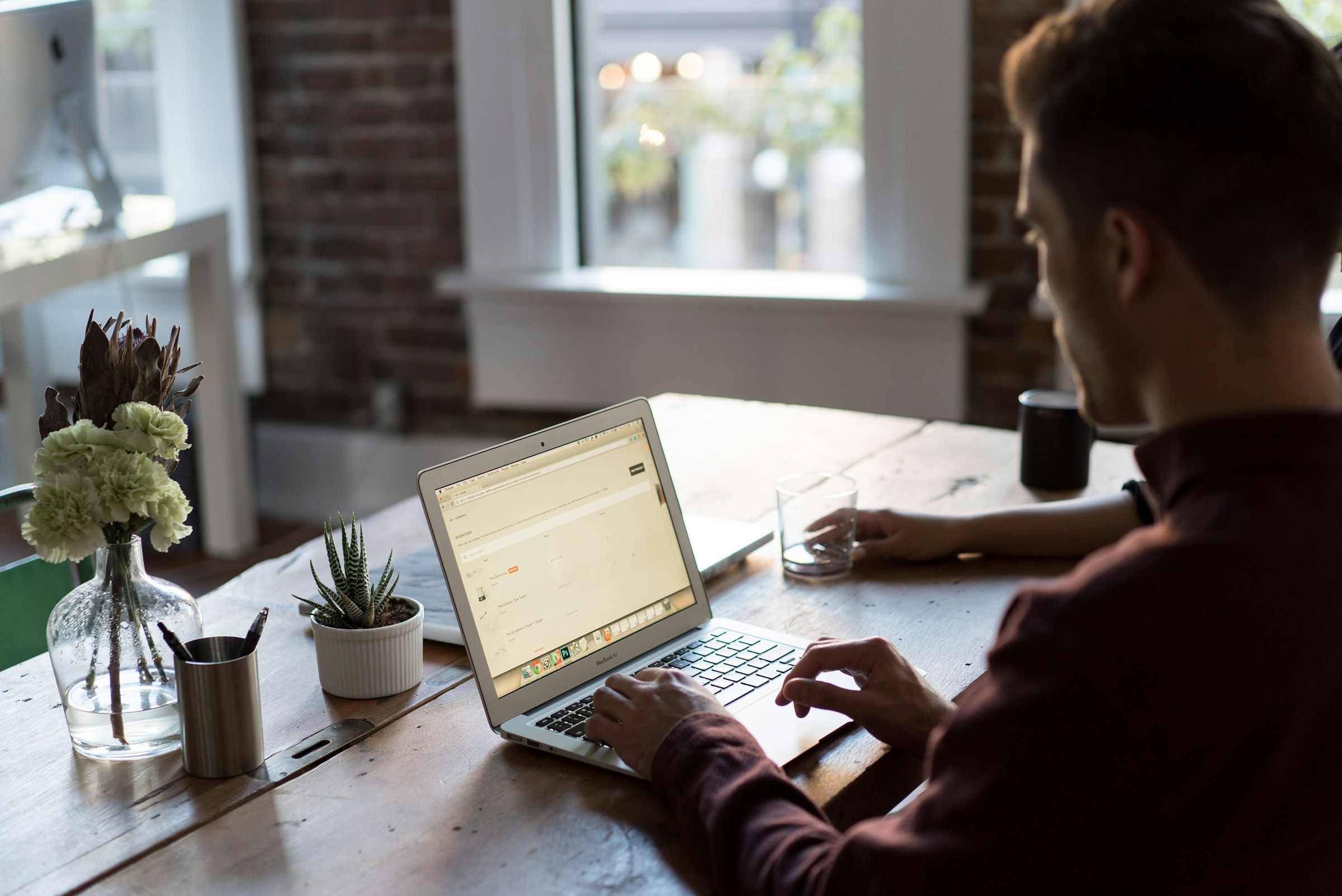 person sitting alone and working hard - How To Cite AI In MLA