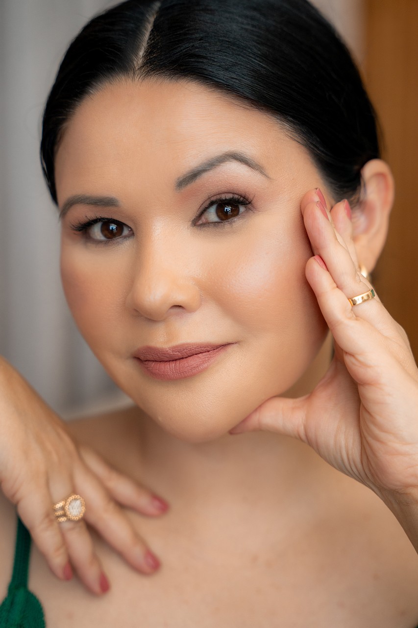 Rachel Stone standing with ABS and hands in her pockets