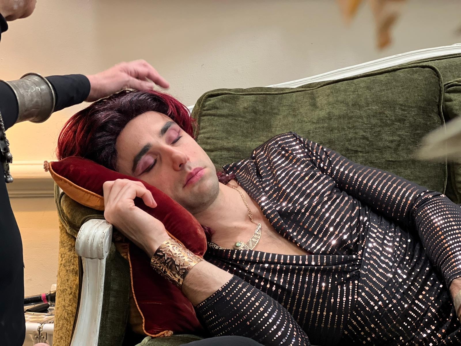 Historic storefronts line a charming small-town street.